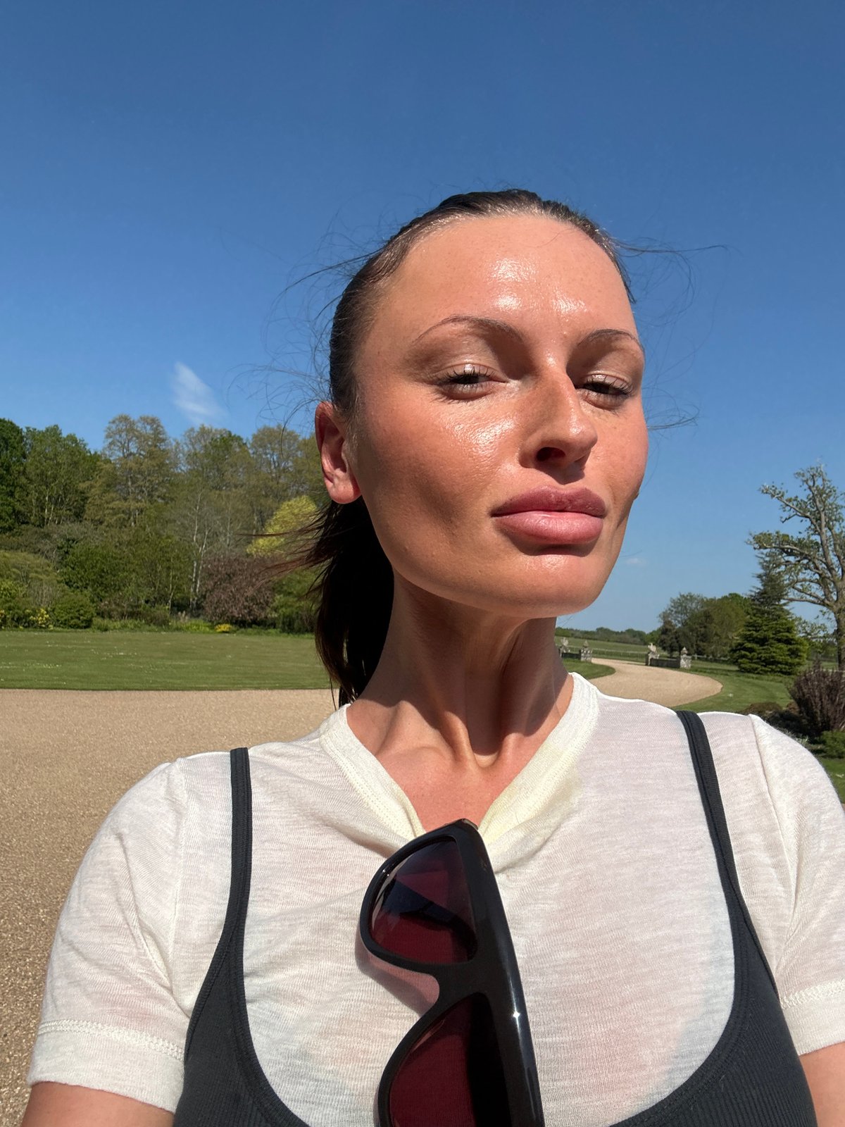 Visitors document sunny afternoon at historic Chichester estate