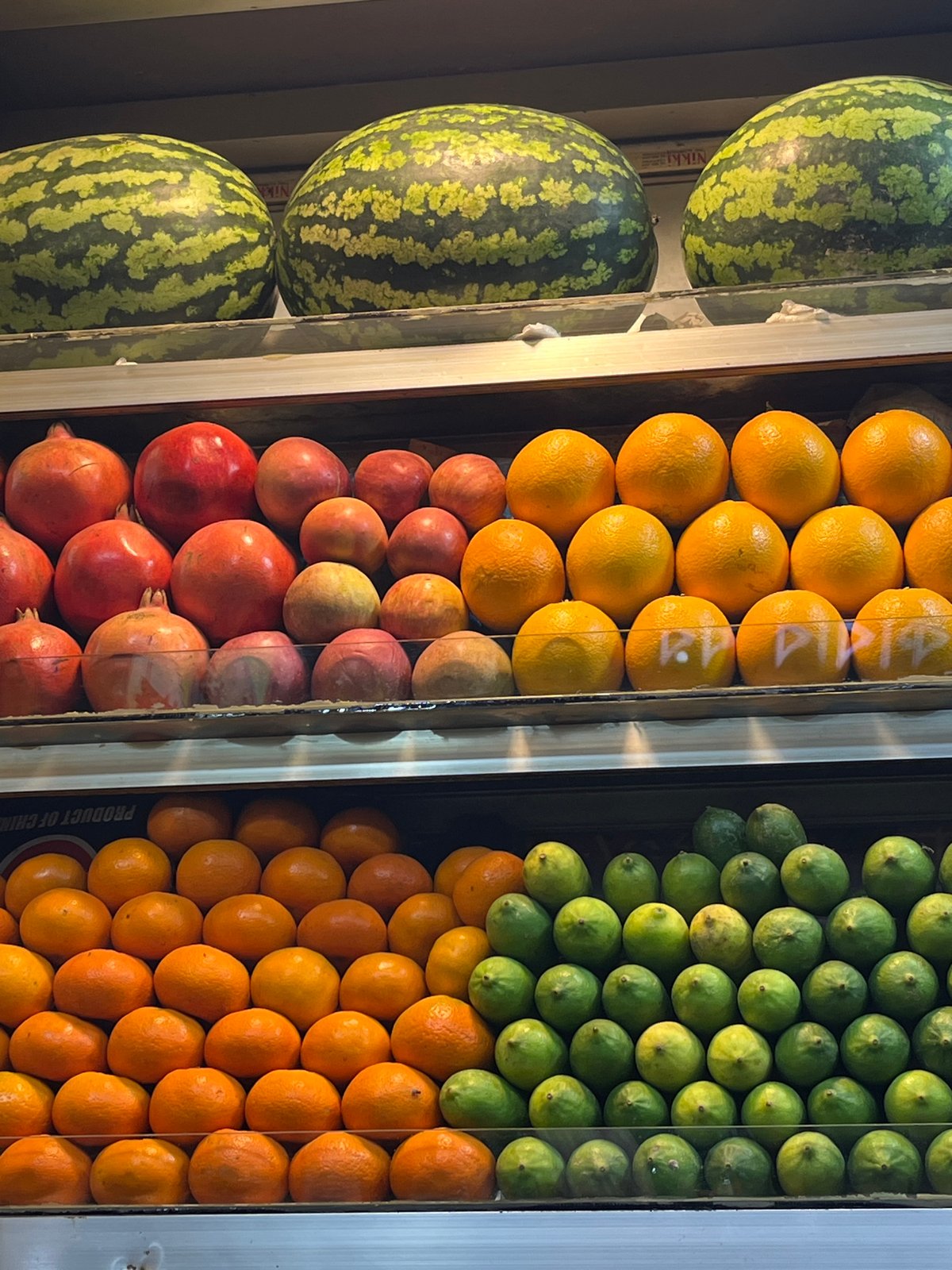 Fruit vendor displays fresh produce at Dhaka market