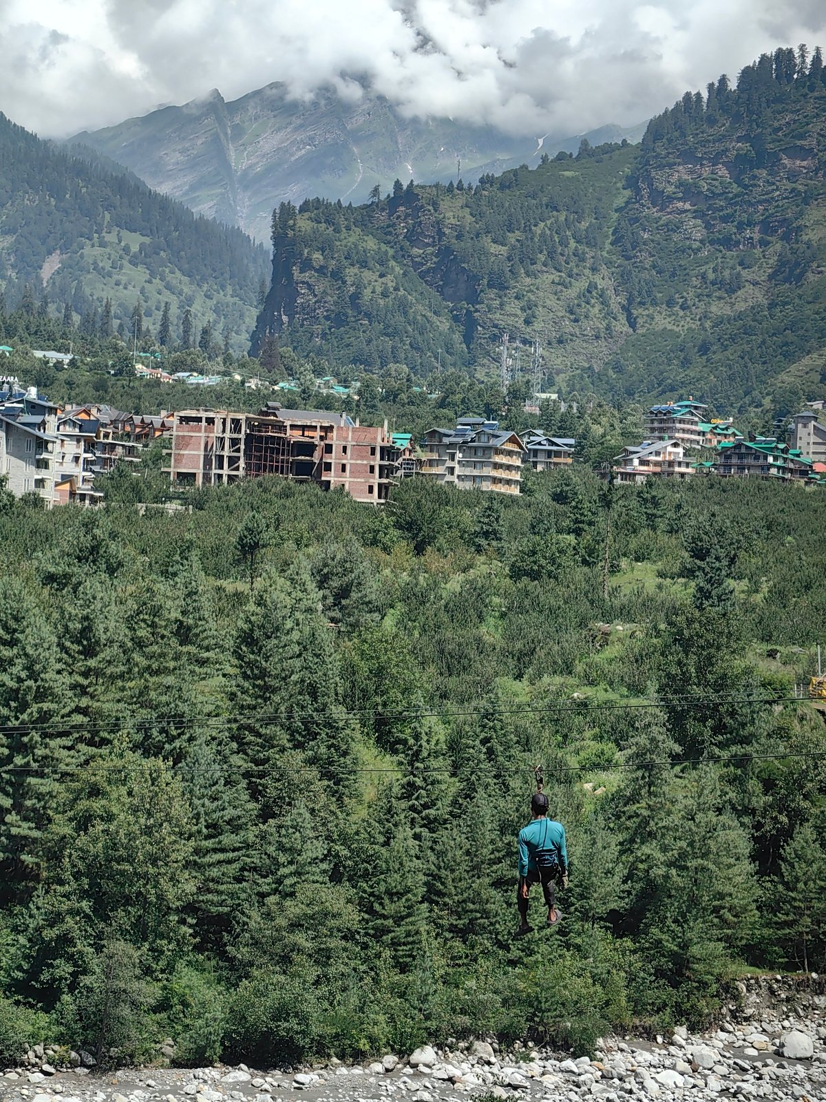 Mountain life in Kullu valley: ziplines, livestock trucks, and winding roads