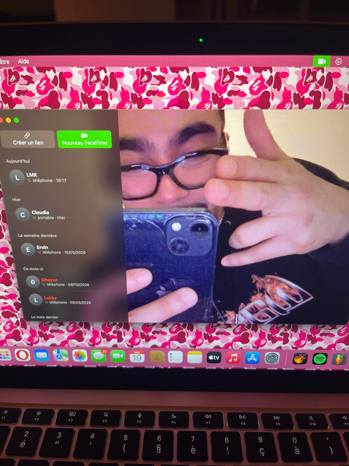 Paris resident enjoys music and video call during evening
