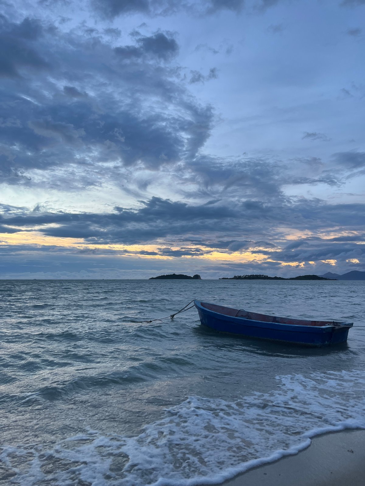 Tourist documents leisurely resort day in Thailand's Baan Plai Laem