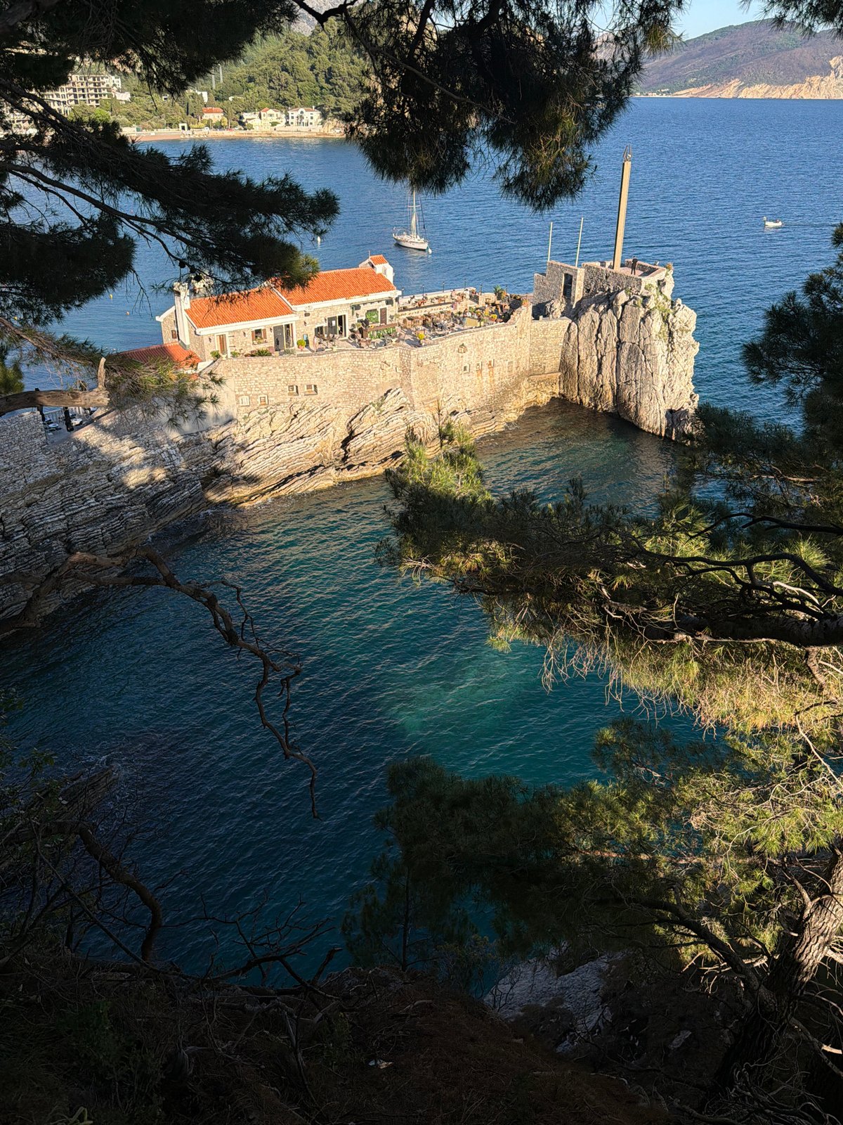 Aerial view captured of Petrovac coastal town from cliff