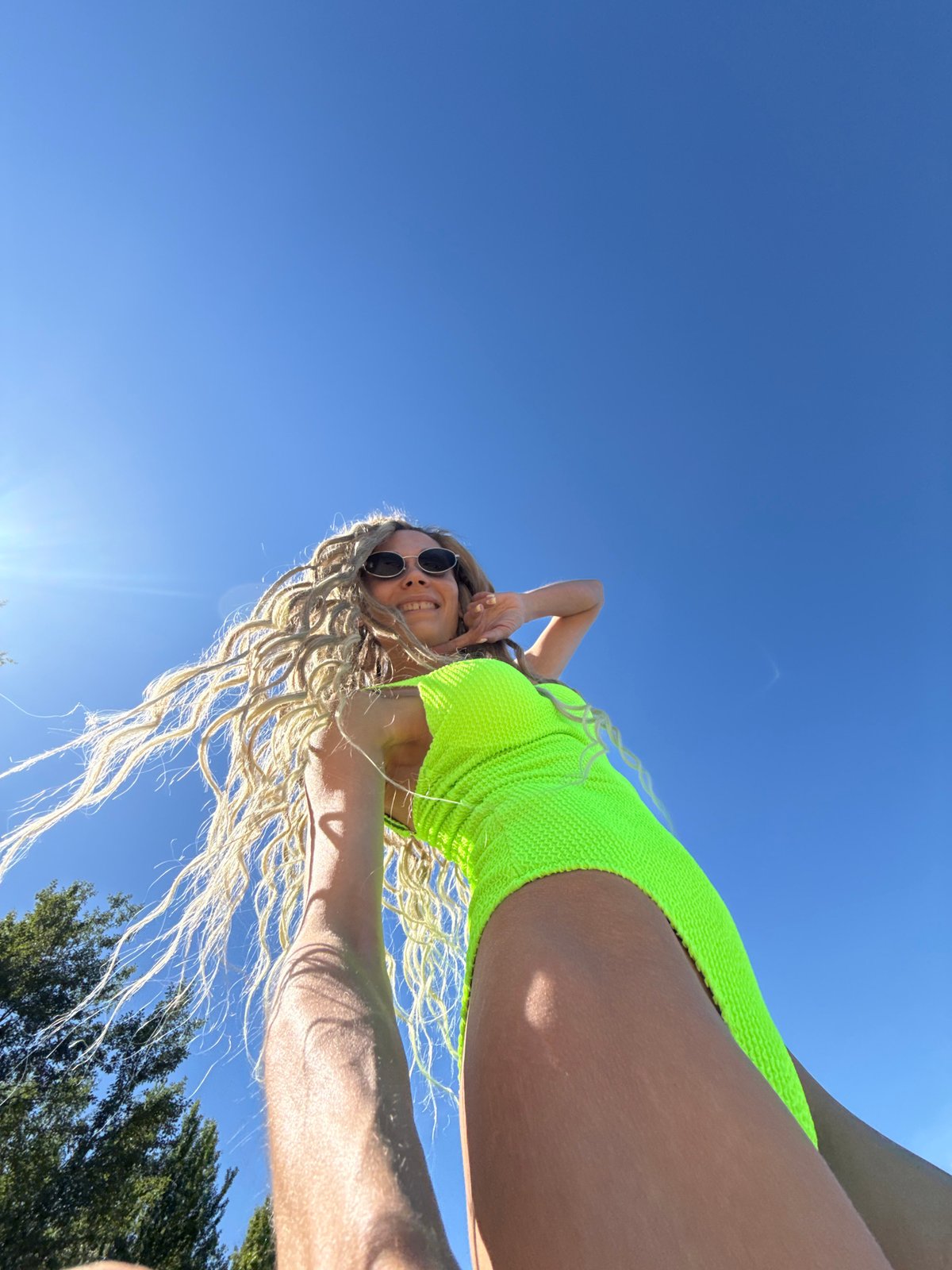 Woman photographed against blue sky in Шебунино, Russia