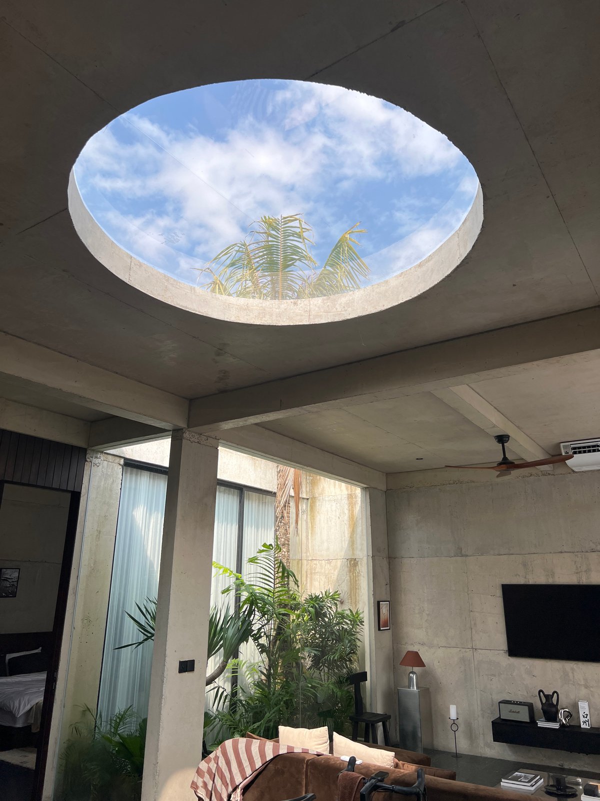 Modern concrete home interior documented in Mengwi, Indonesia