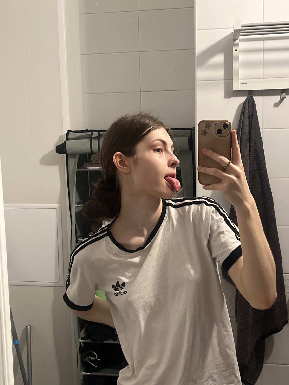Mirror selfie captured in Saint Petersburg bathroom setting