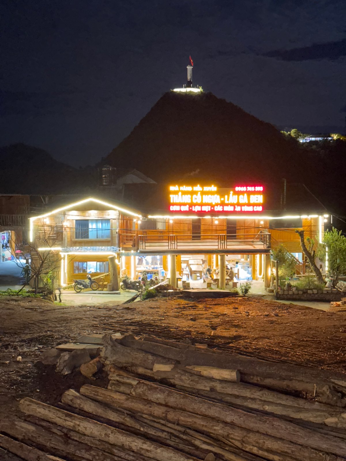 Visitors photograph cats at rural Vietnam commune locations