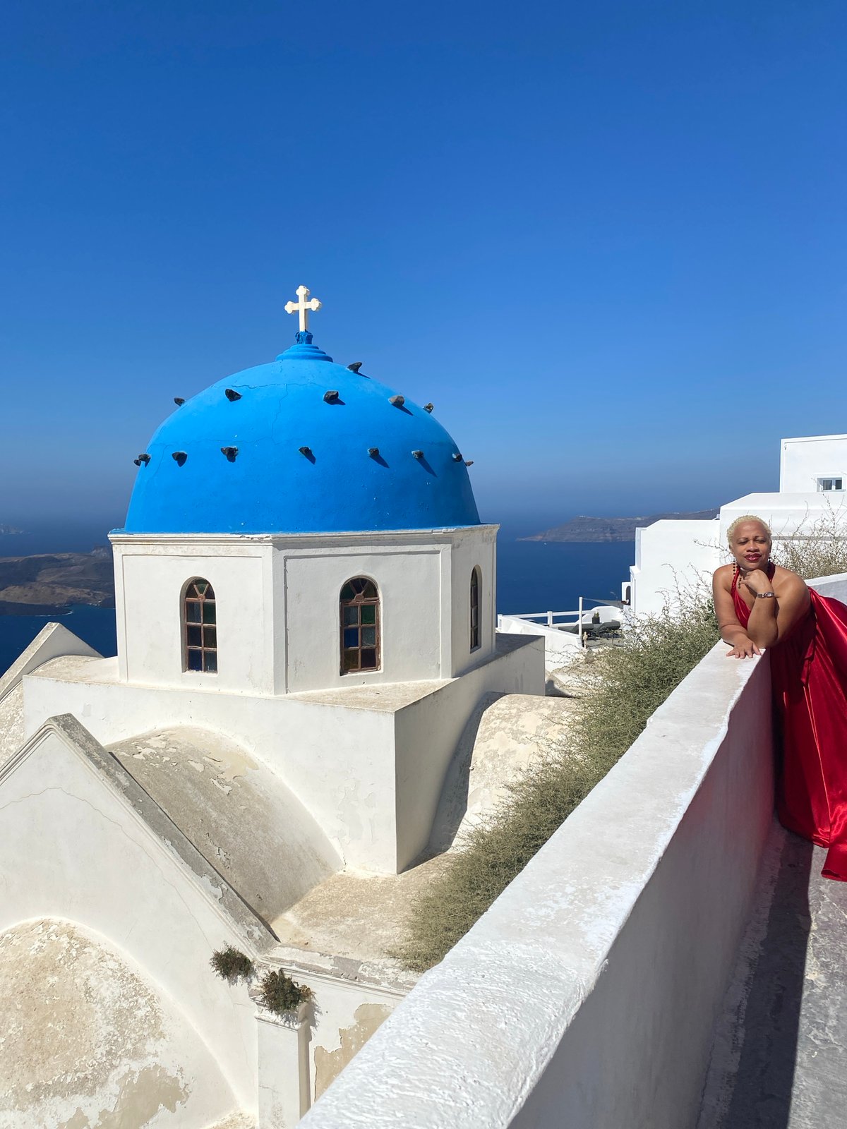 Morning at a blue-domed church in Santorini