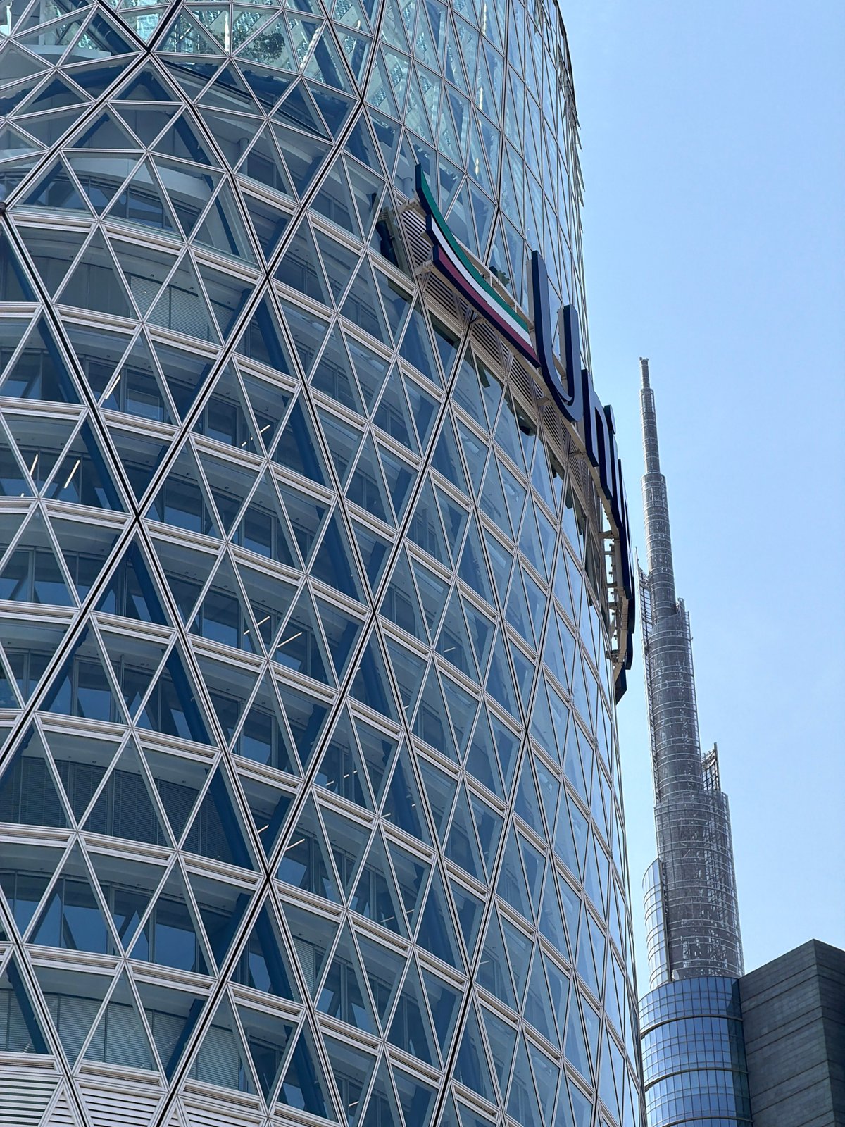 Exploring Porta Nuova's modern skyline on a sunny Milan afternoon
