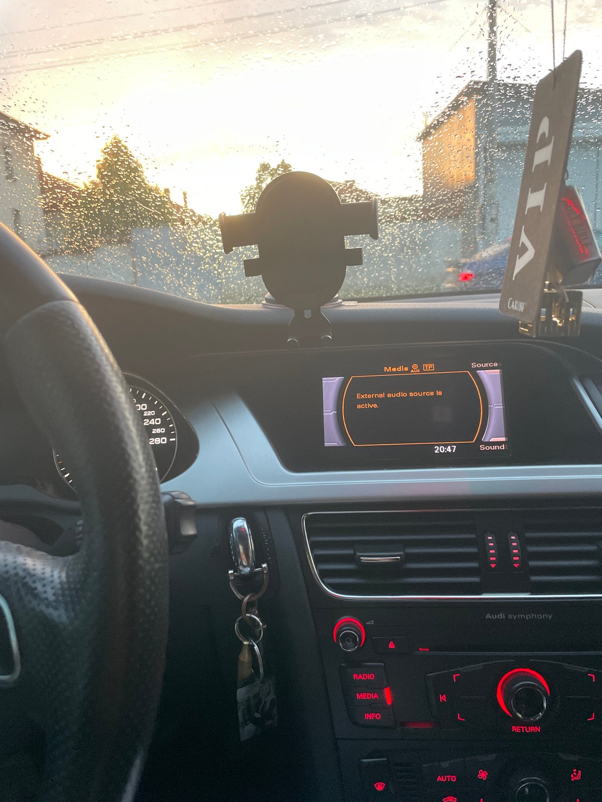 Driver documents rainy evening commute in Audi, Ihtiman Bulgaria