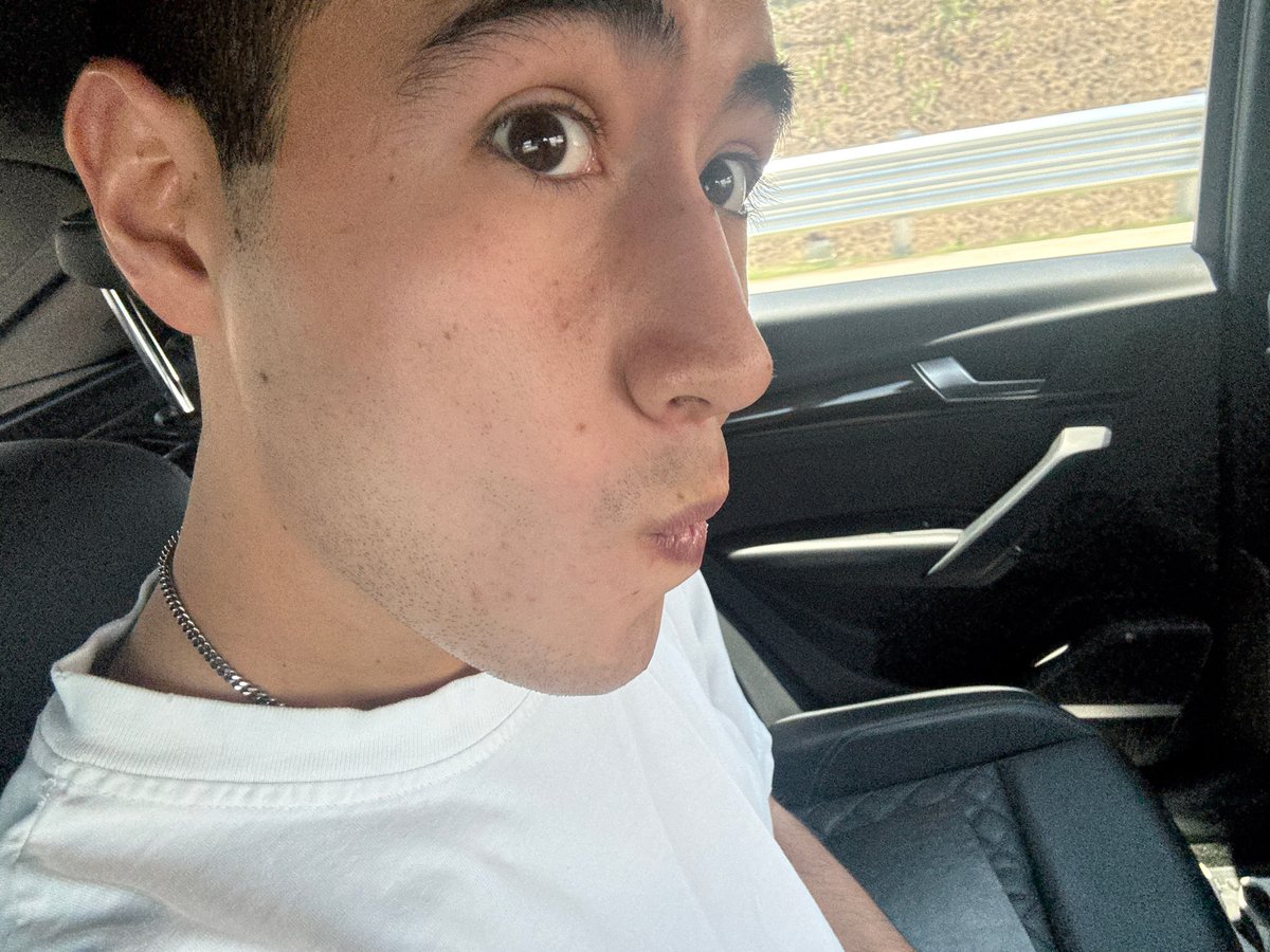 Young man photographed inside moving car in Ocotlán, Mexico