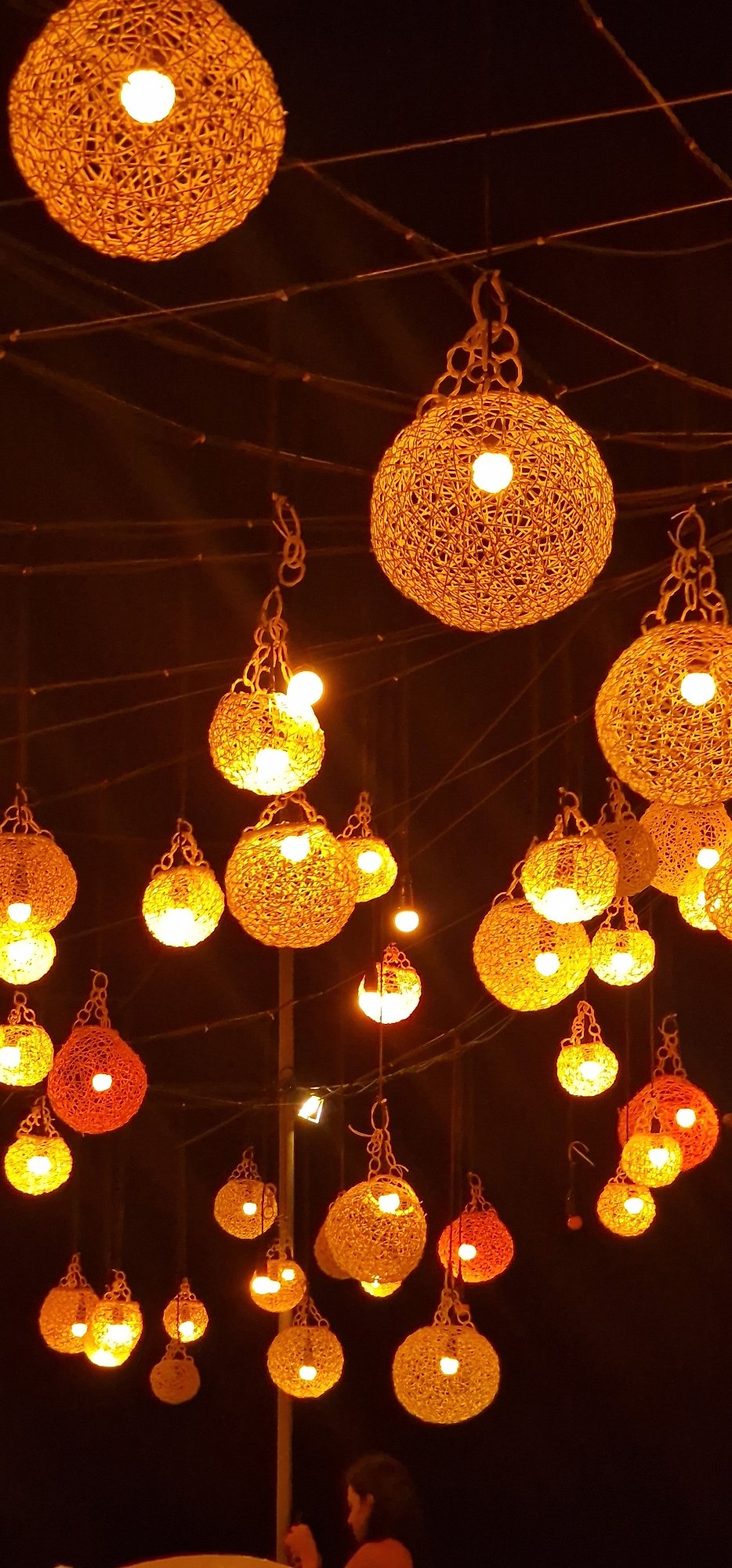 Evening dining scene captured at illuminated Mirissa restaurant