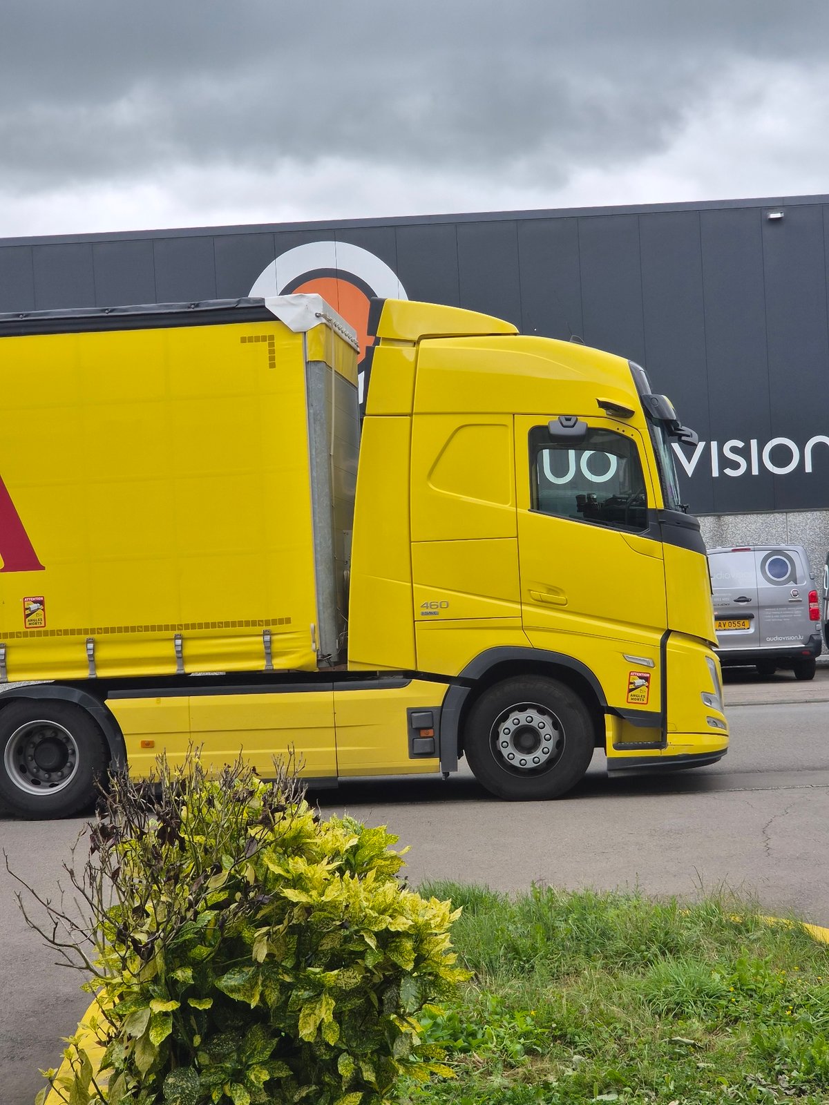 Morning scenes documented at Luxembourg logistics facility during rainfall