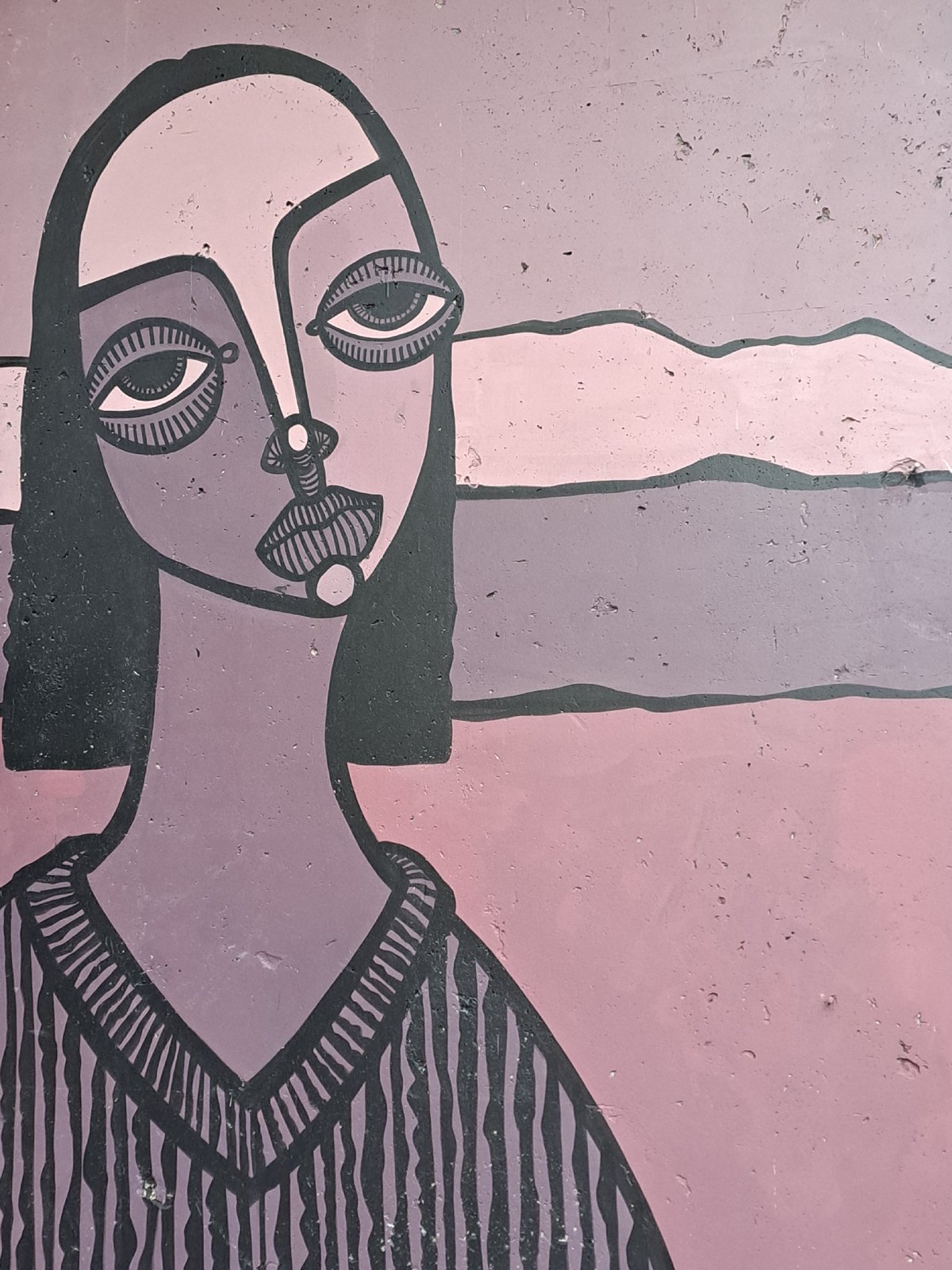 Public art documented in Yerevan: cubist mural, flower-adorned statue