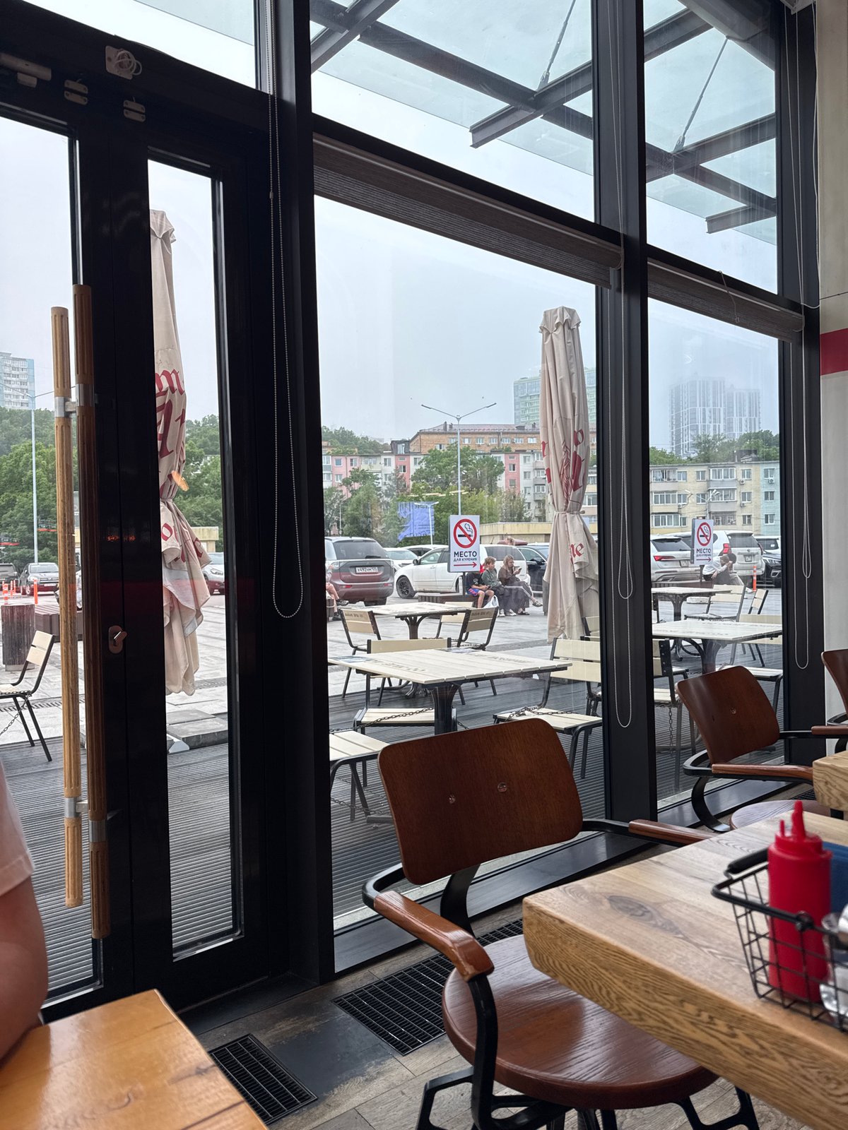 Inside a Vladivostok café with industrial décor and cold drinks