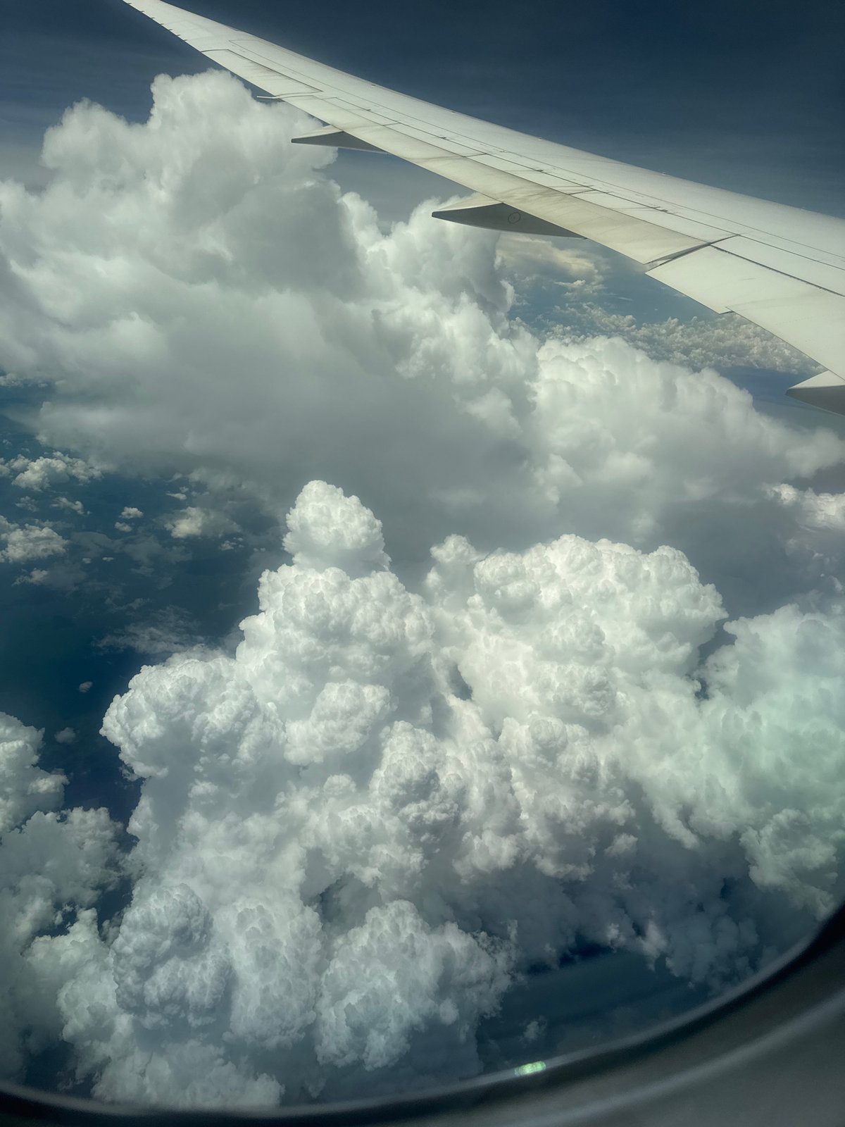 Morning flight over Thuận An, clouds, rivers, and cabin life