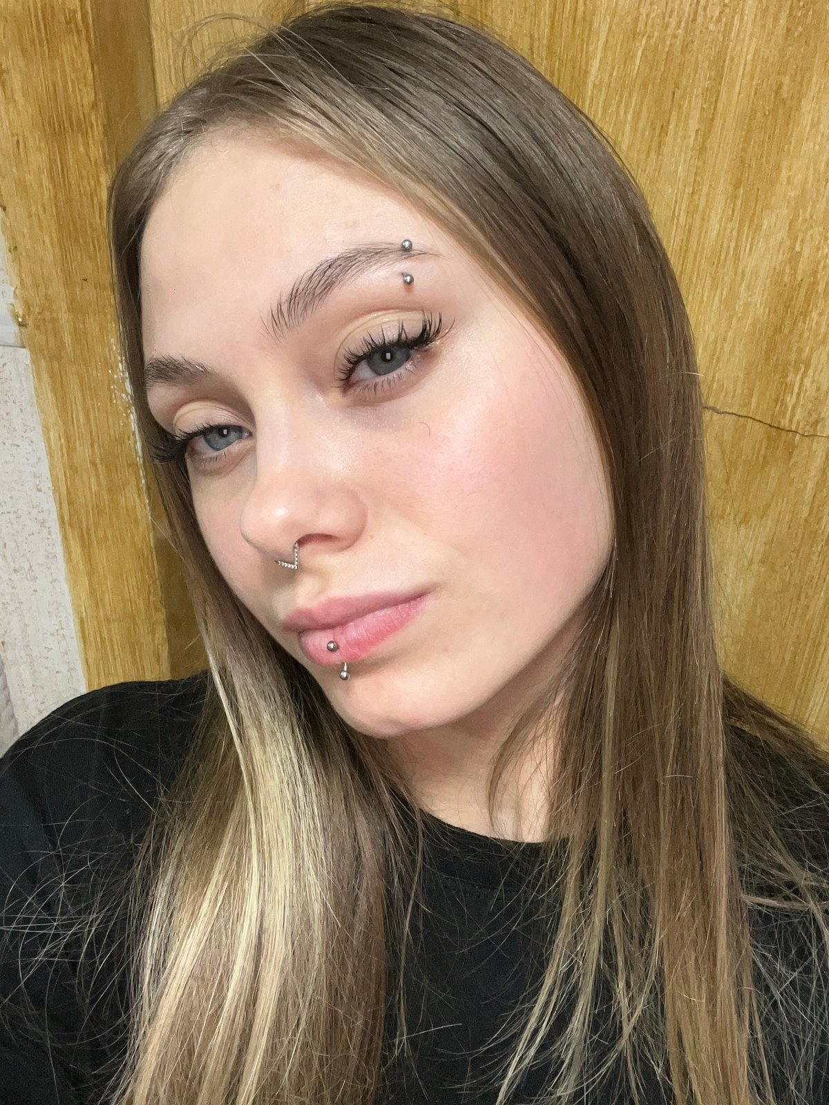 Young woman with facial piercings observed in Фоки, Russia
