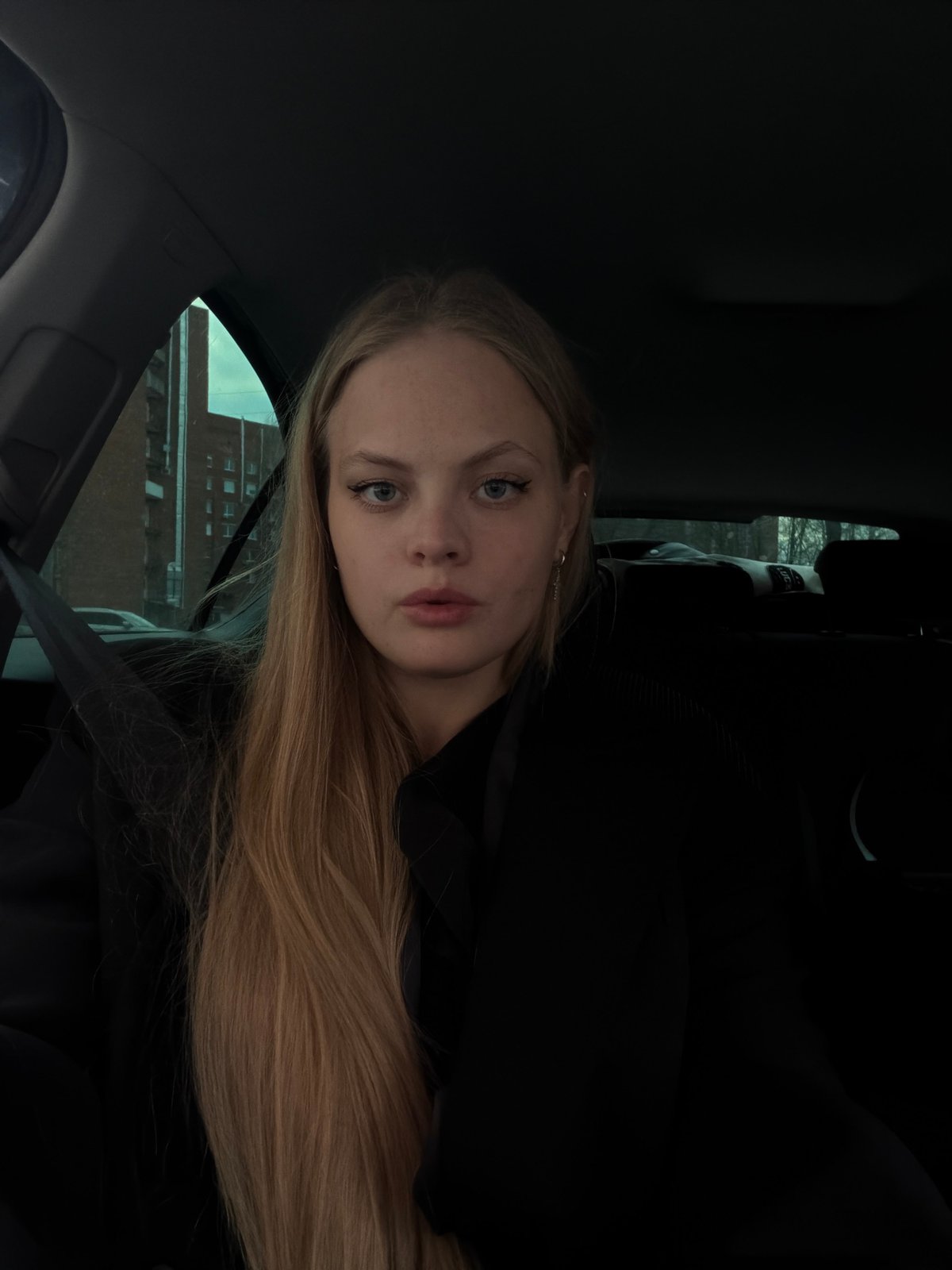Woman photographed in car passenger seat in Izhevsk