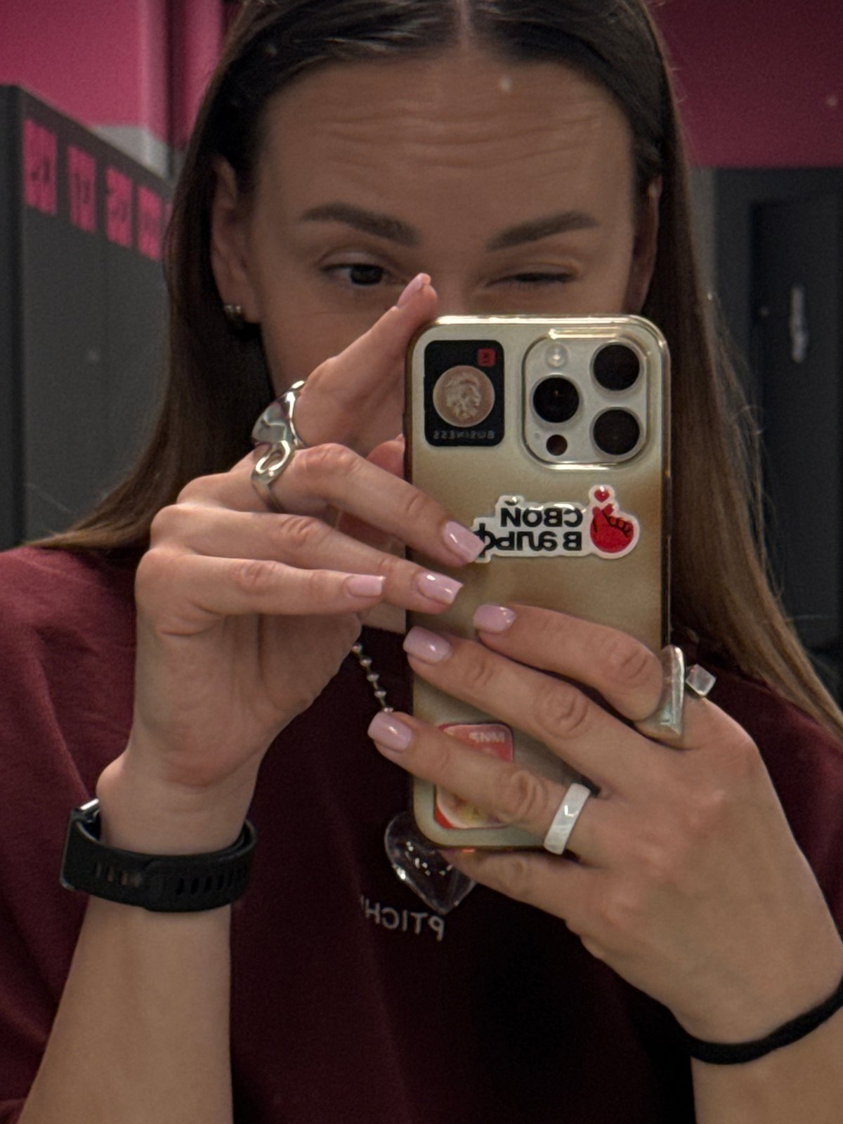 Woman takes mirror selfies in Sochi locker room