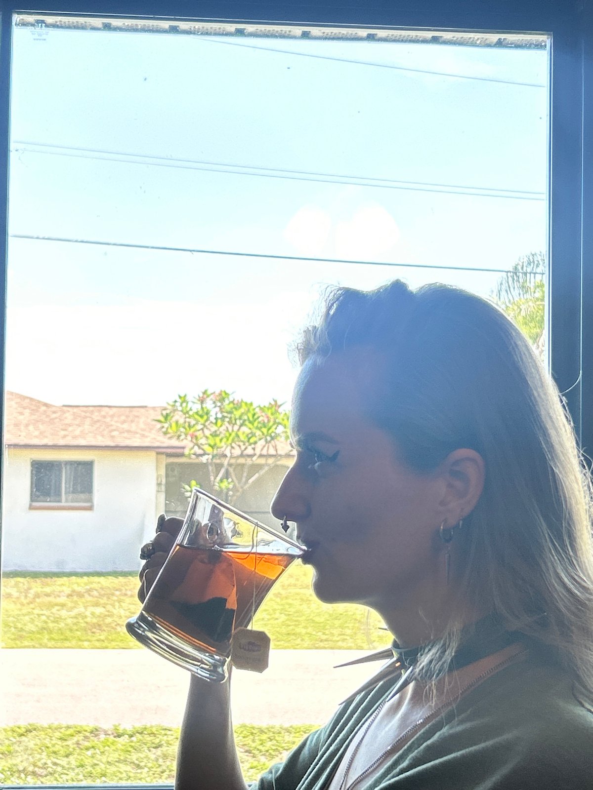 Woman enjoys afternoon tea in Cape Coral home