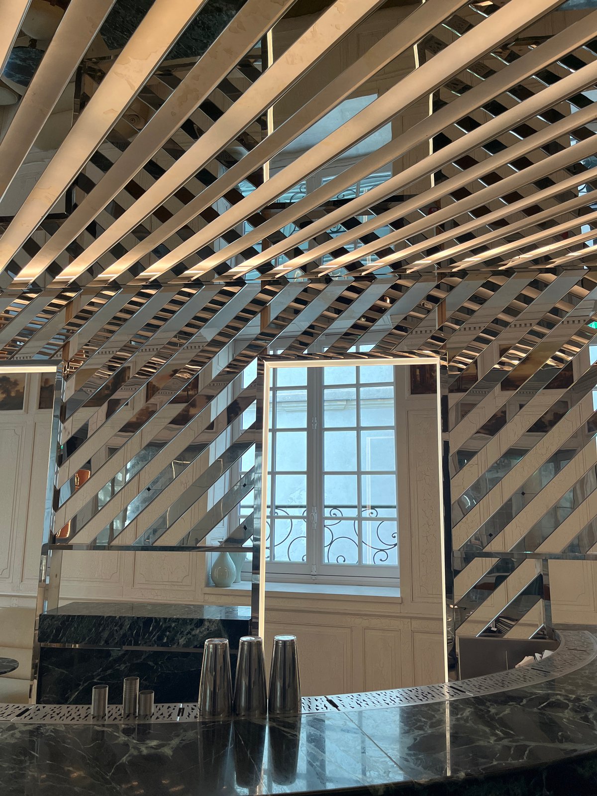 Light patterns documented in Parisian architectural interior