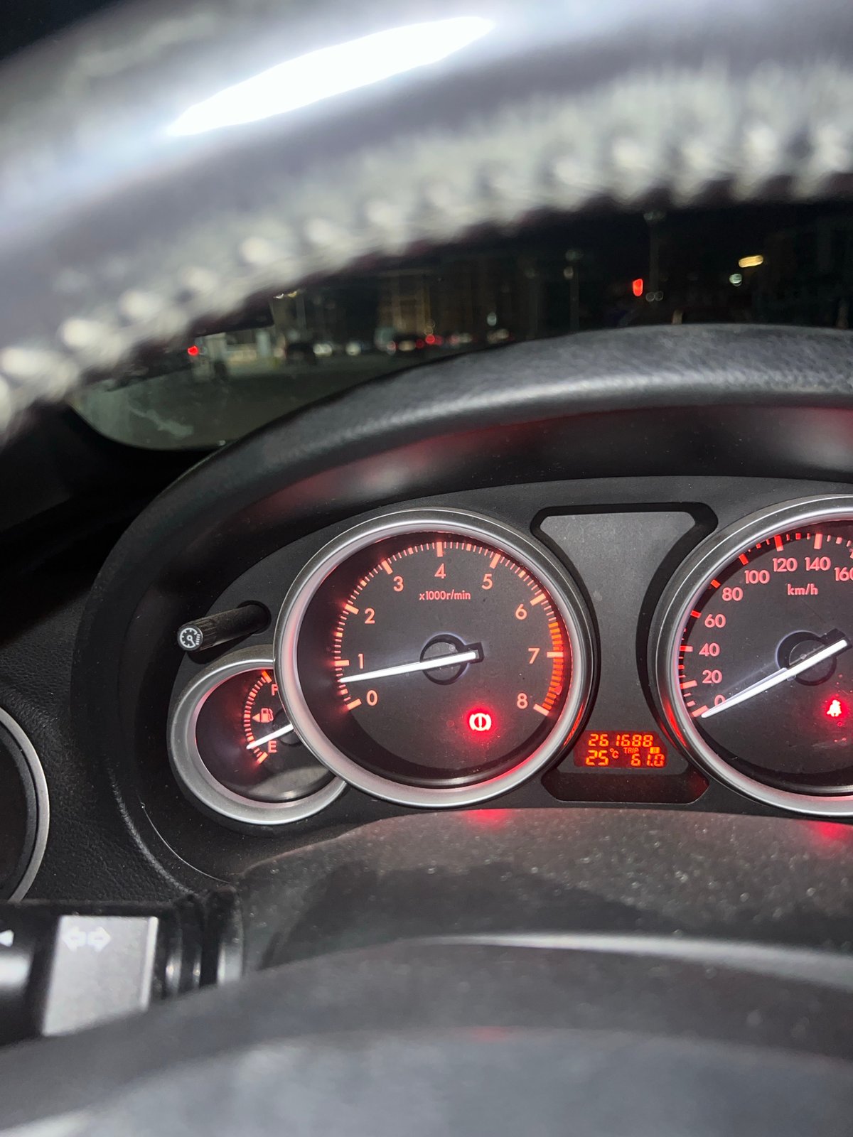 Driver monitors low fuel dashboard in Burgas Bulgaria