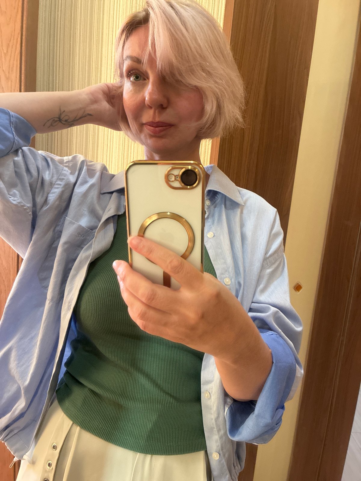 Woman takes mirror selfies in Sochi apartment