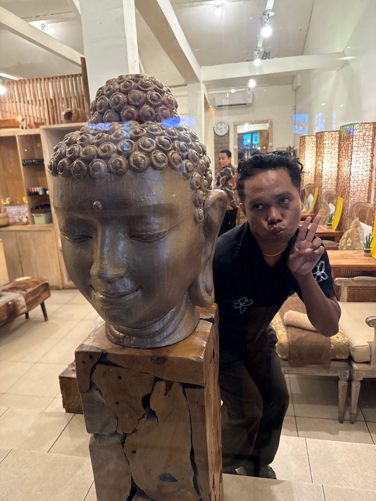Kuta's nightlife strip buzzing with bars, themed venues, and street scenes.