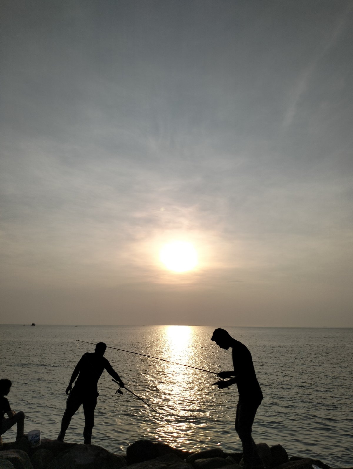 Evening fishing session captured along Lhokseumawe coastline