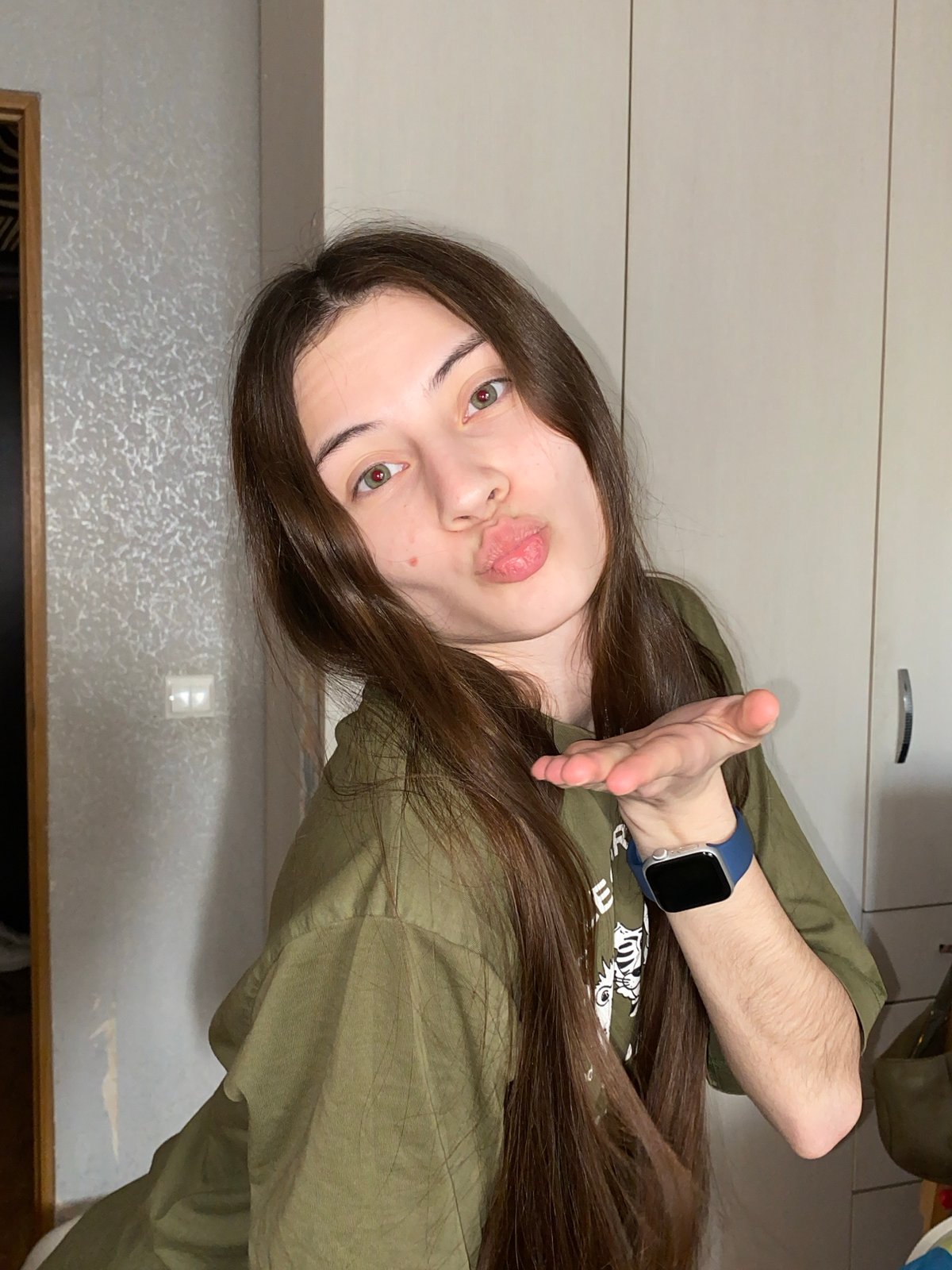 Woman and dog share quiet moments in Votkinsk home