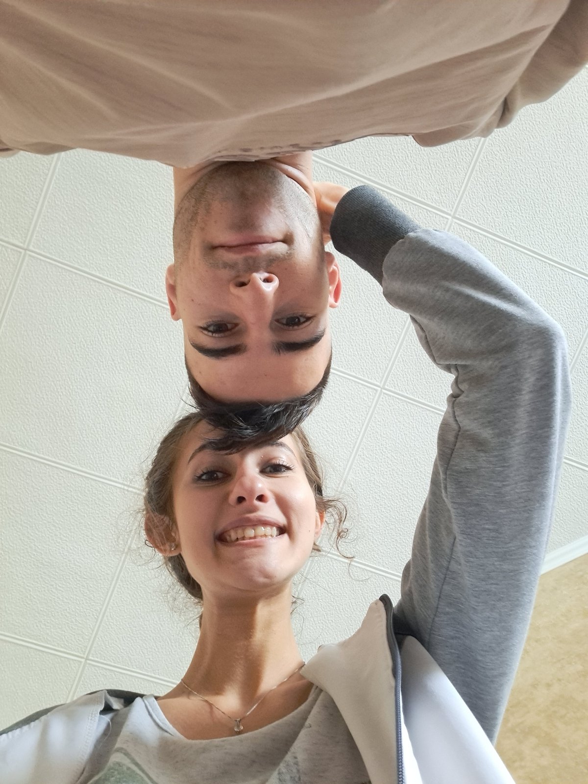 Couple takes mirror selfie in Bulgarian home