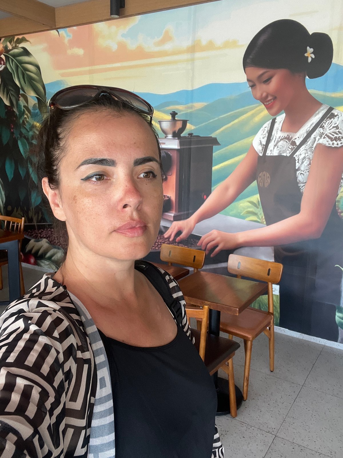 Hanging out at a mural-covered coffee cafe in Kuta Selatan