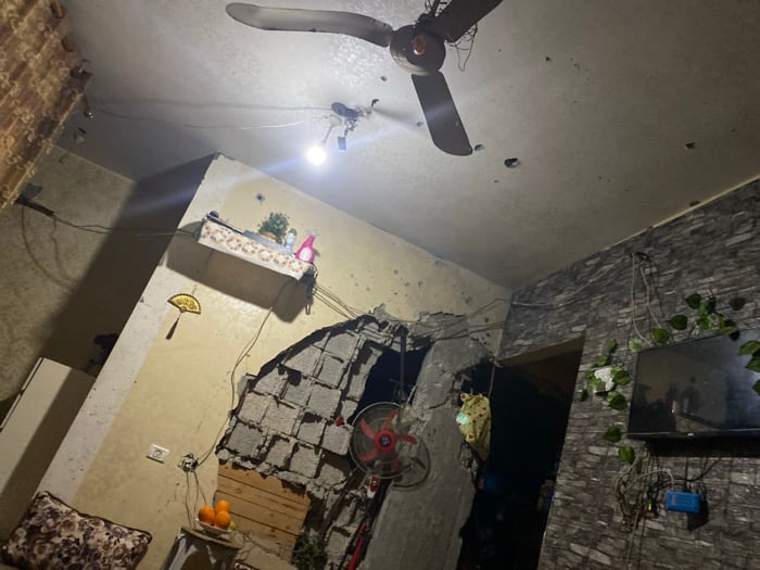 Damaged residential interiors documented in Khan Yunis