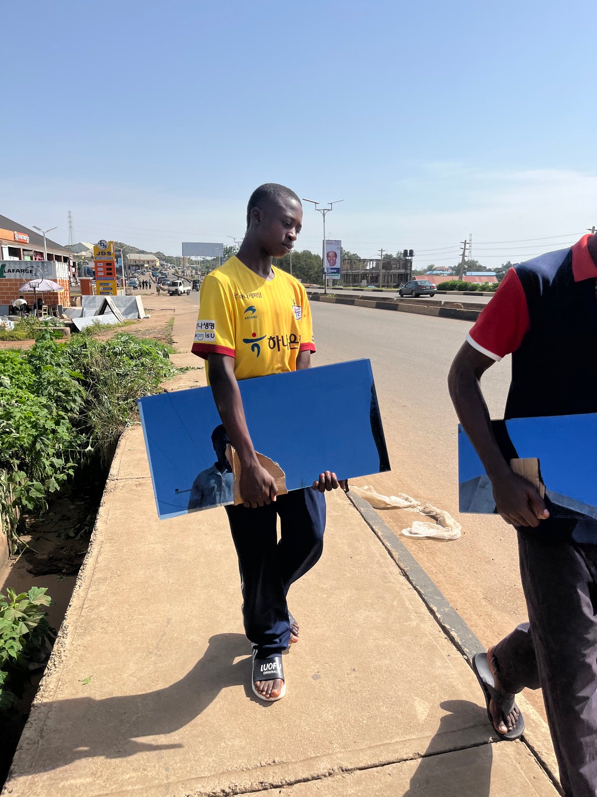 Morning street activity across Gura Top, Nigeria