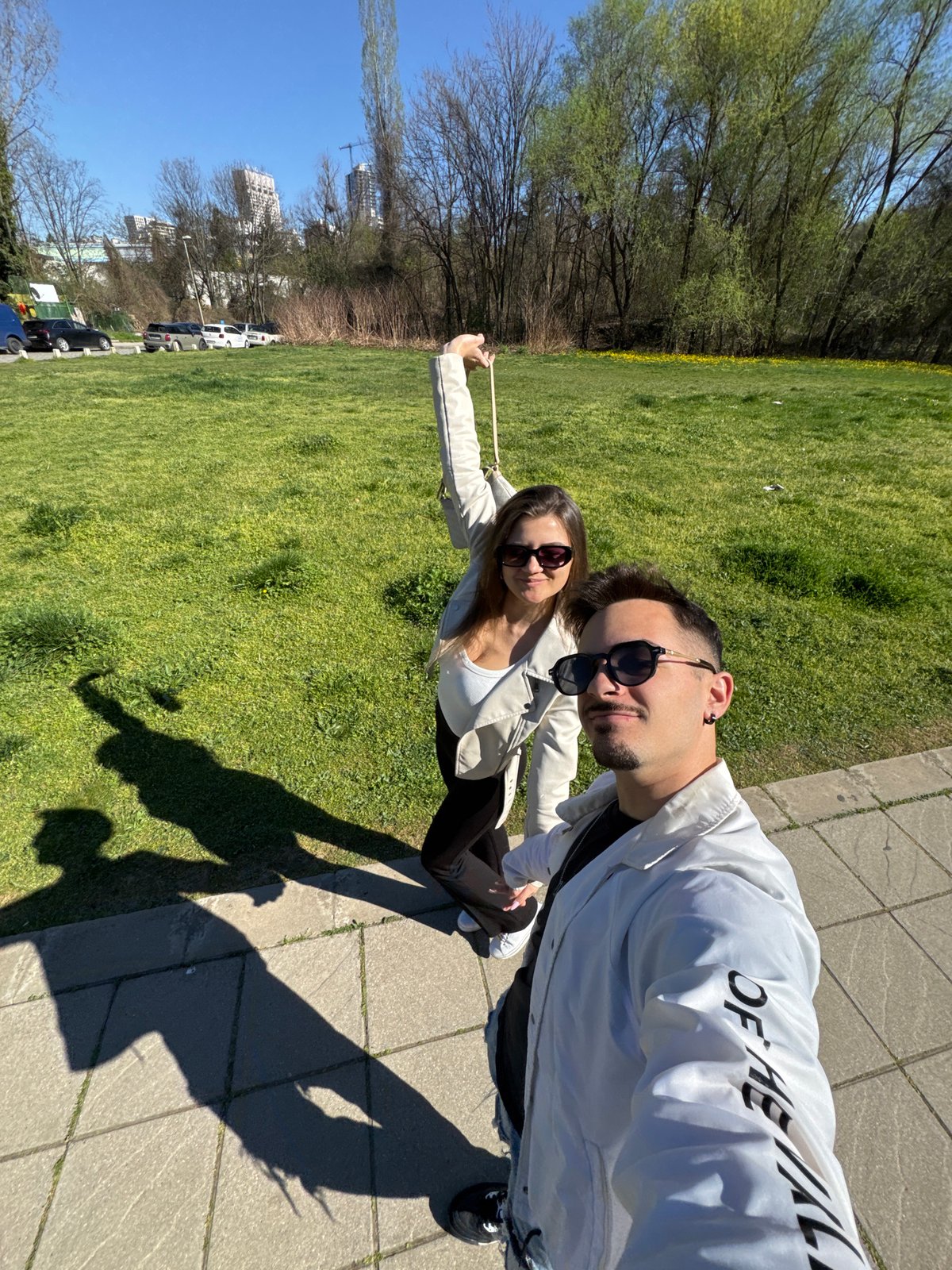Couple takes sunny afternoon selfie in Sofia park