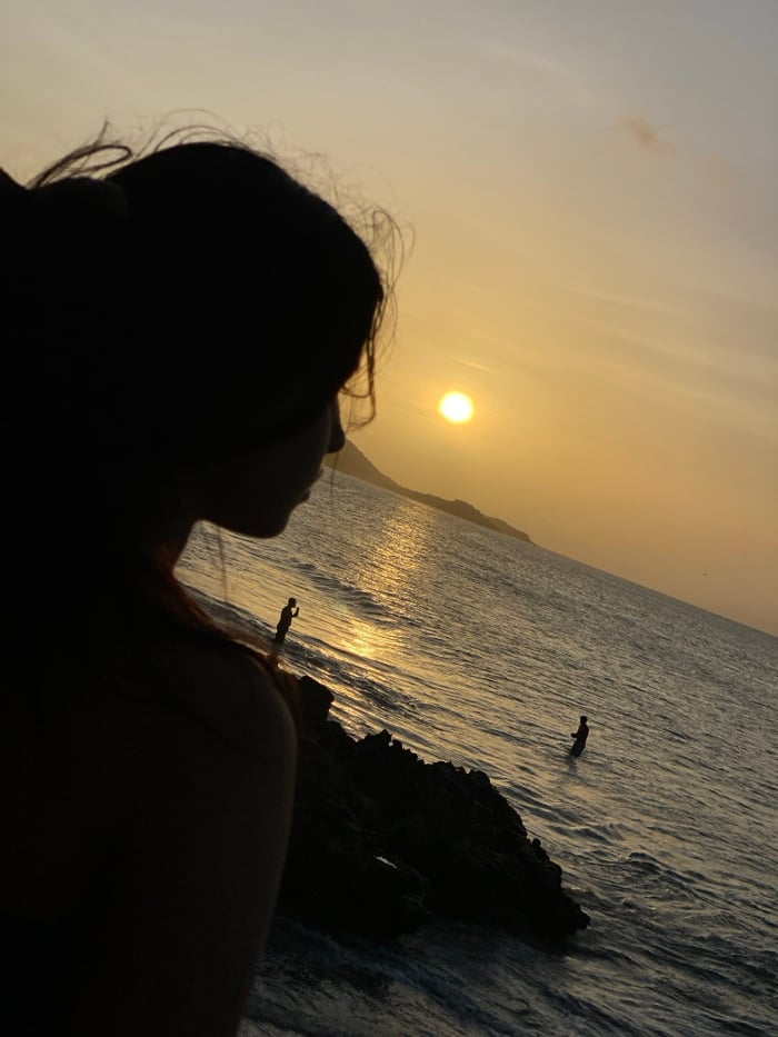 Sunset silhouette photography session at Juan Griego coastal rocks