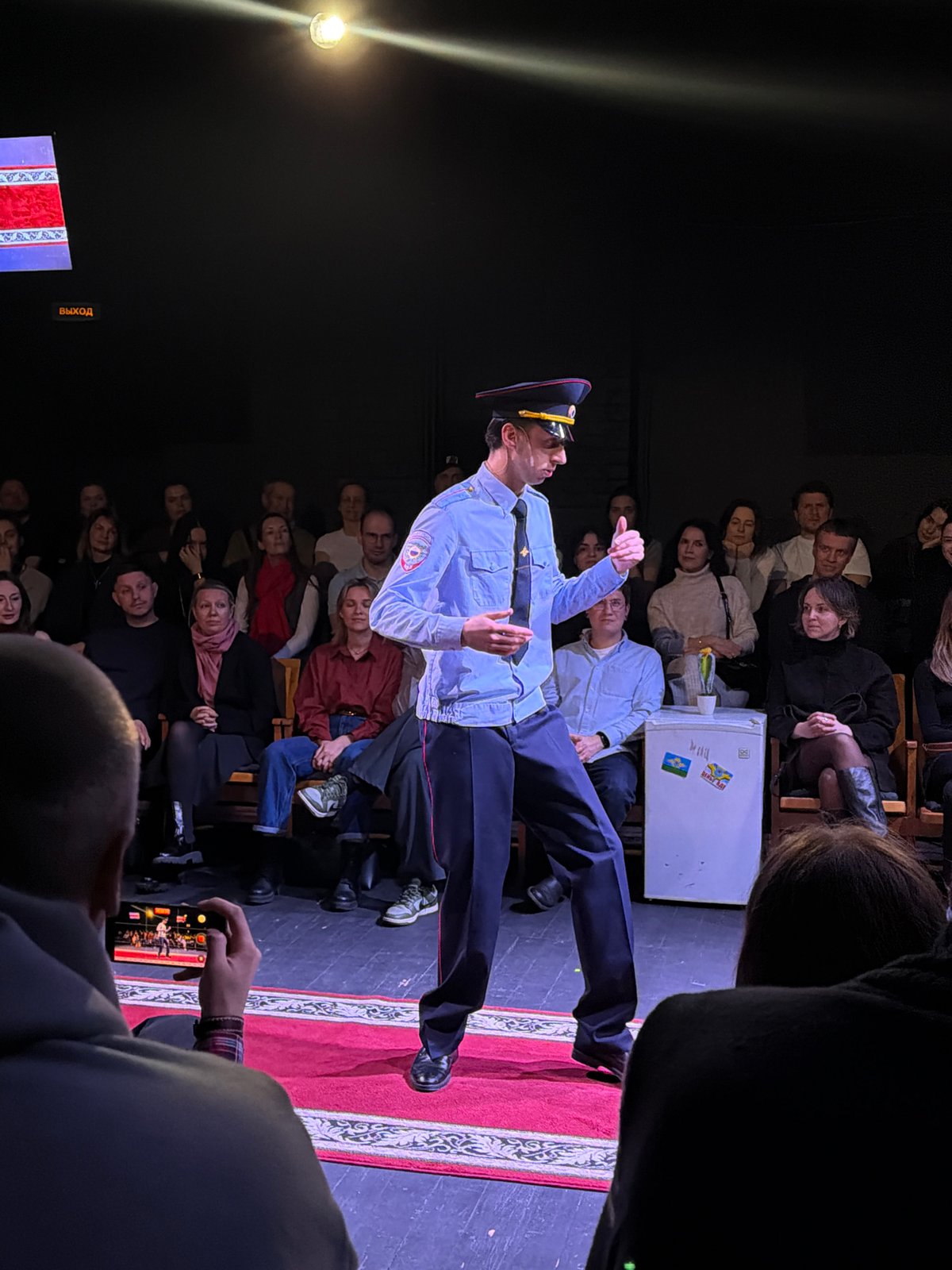 Performance event held in Moscow venue with red lighting