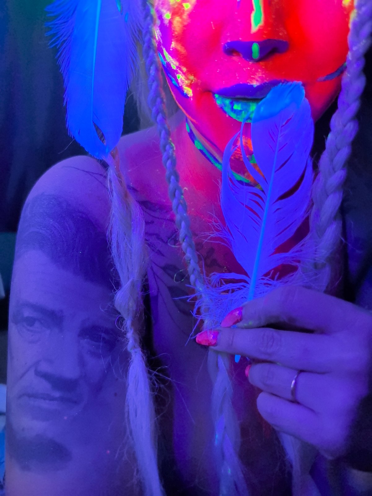 UV body paint portrait session captured in Noviy, Russia