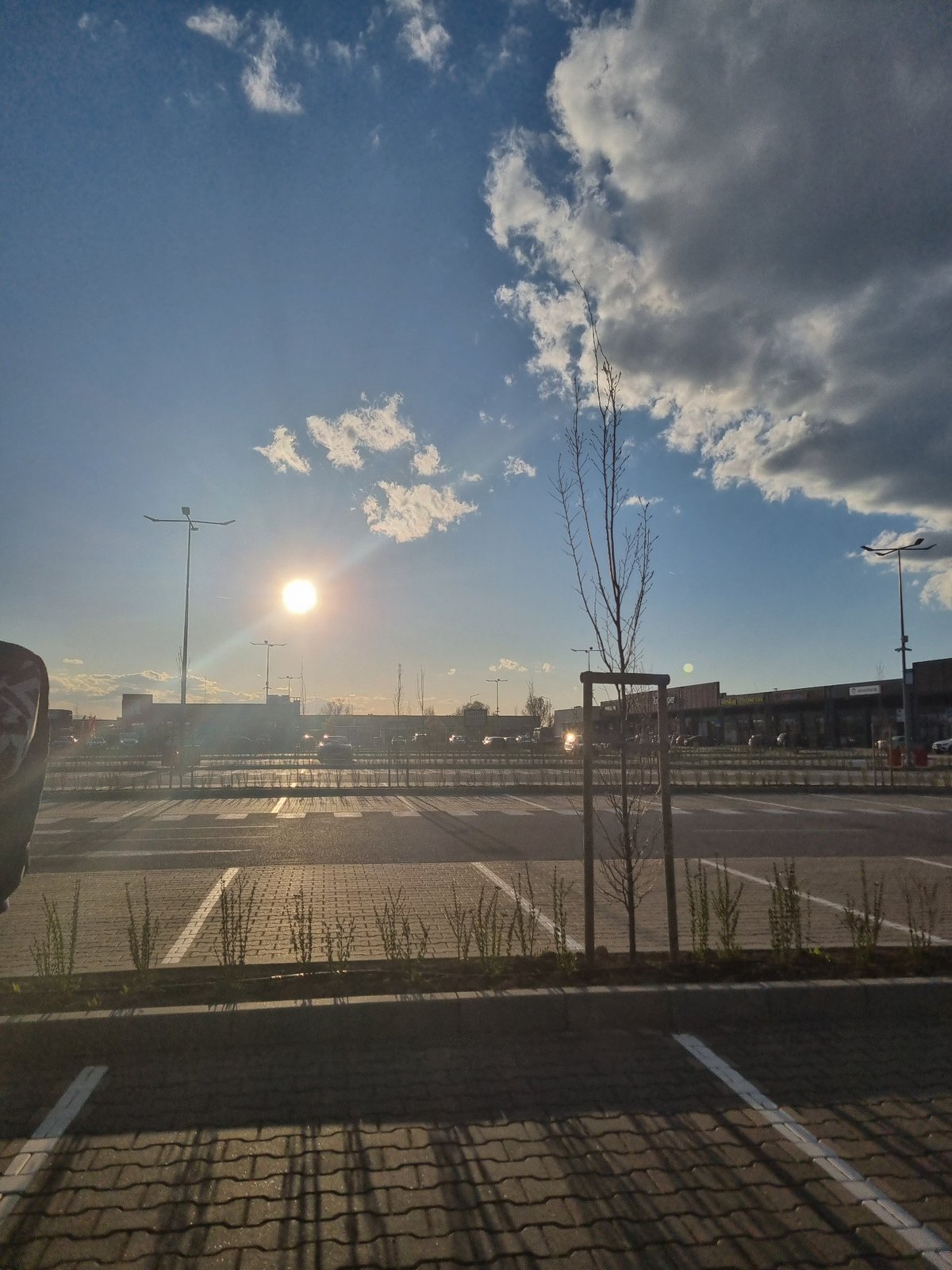 Sunny afternoon parking lot scene documented in Sofia