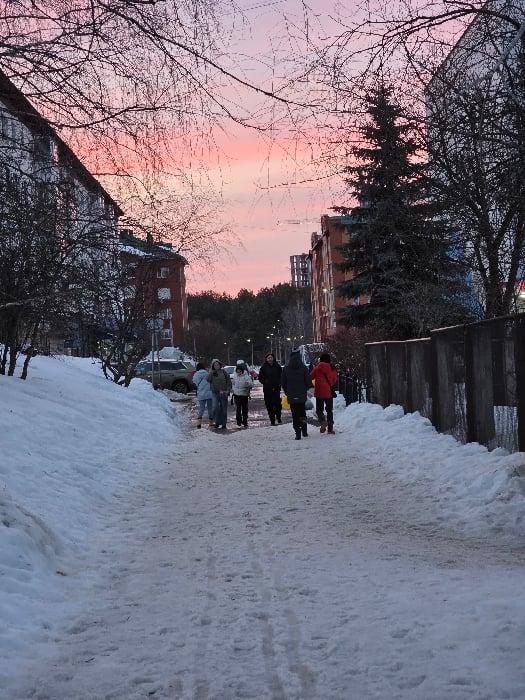 Daily life moments captured across Chaikovsky, Russia winter afternoon