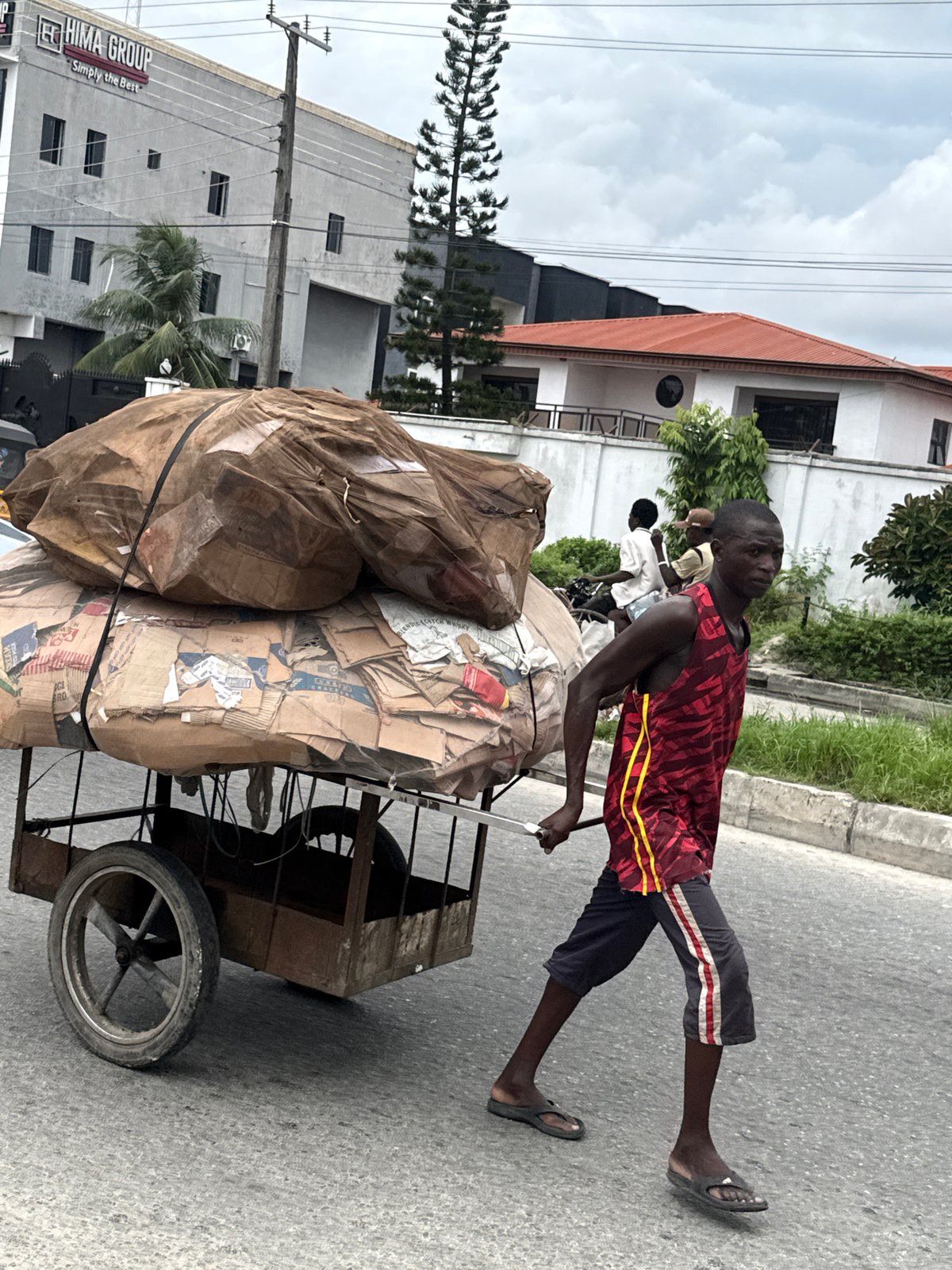 Afternoon street life and work scenes in Ado, Nigeria