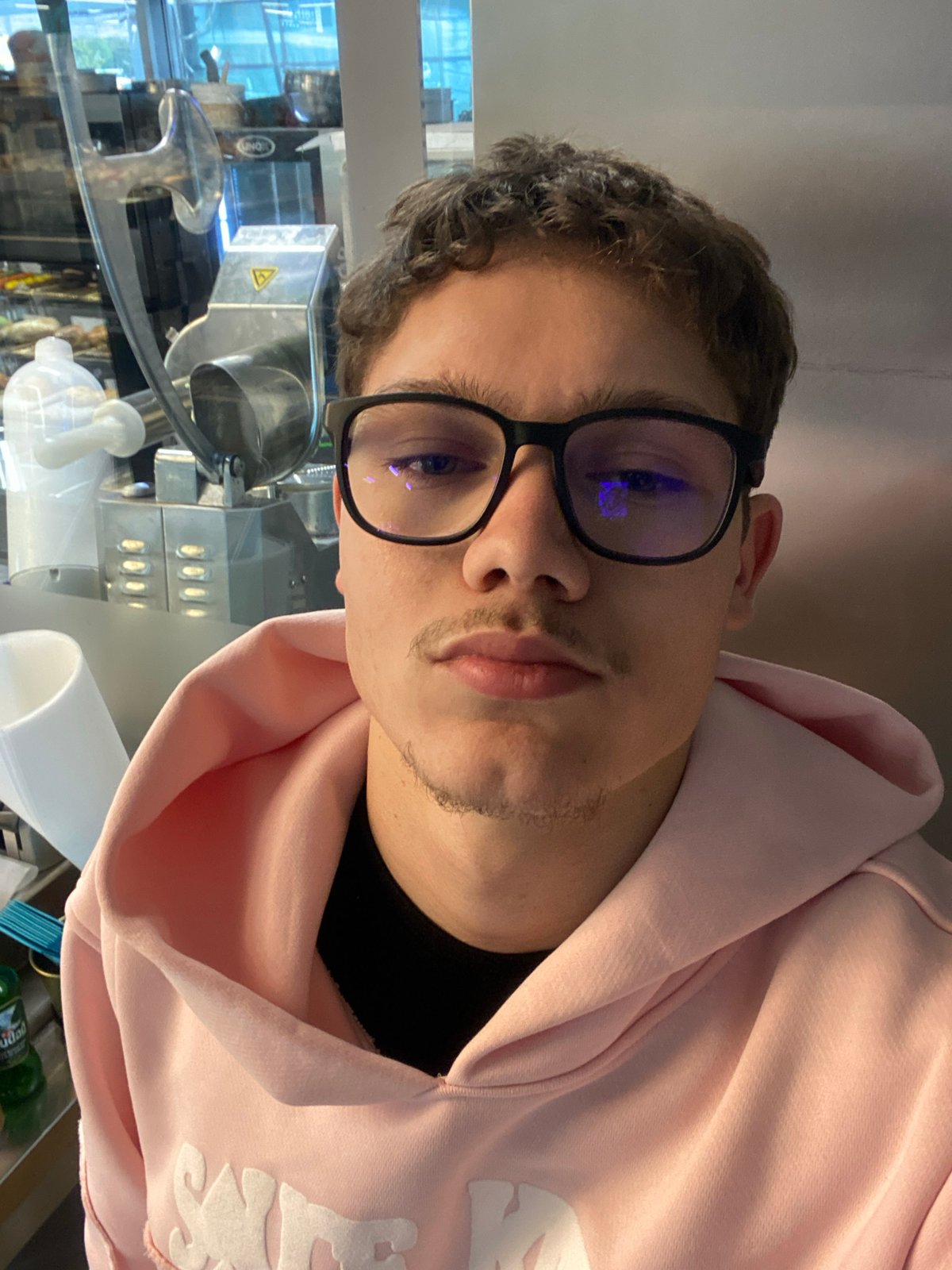 Young man photographed in Sofia wearing reflective glasses