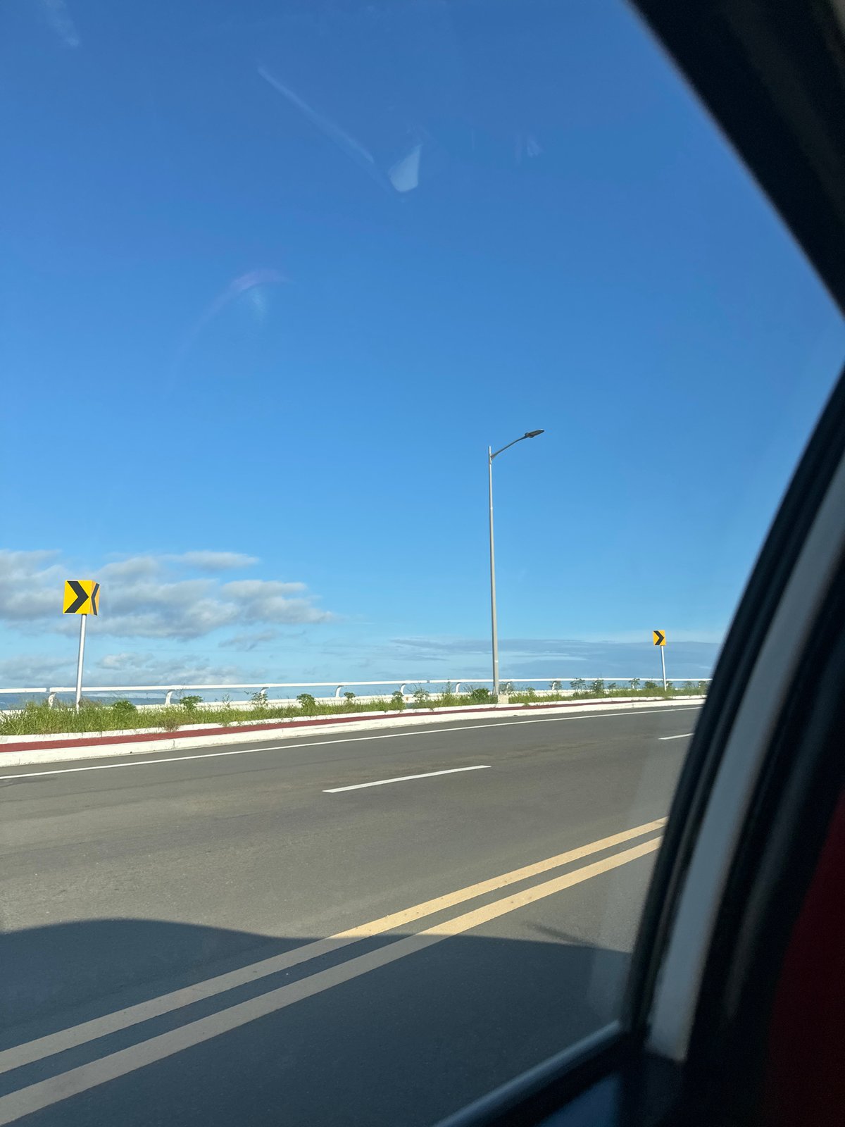 Vehicle crosses cable-stayed bridge in Davao City during morning commute