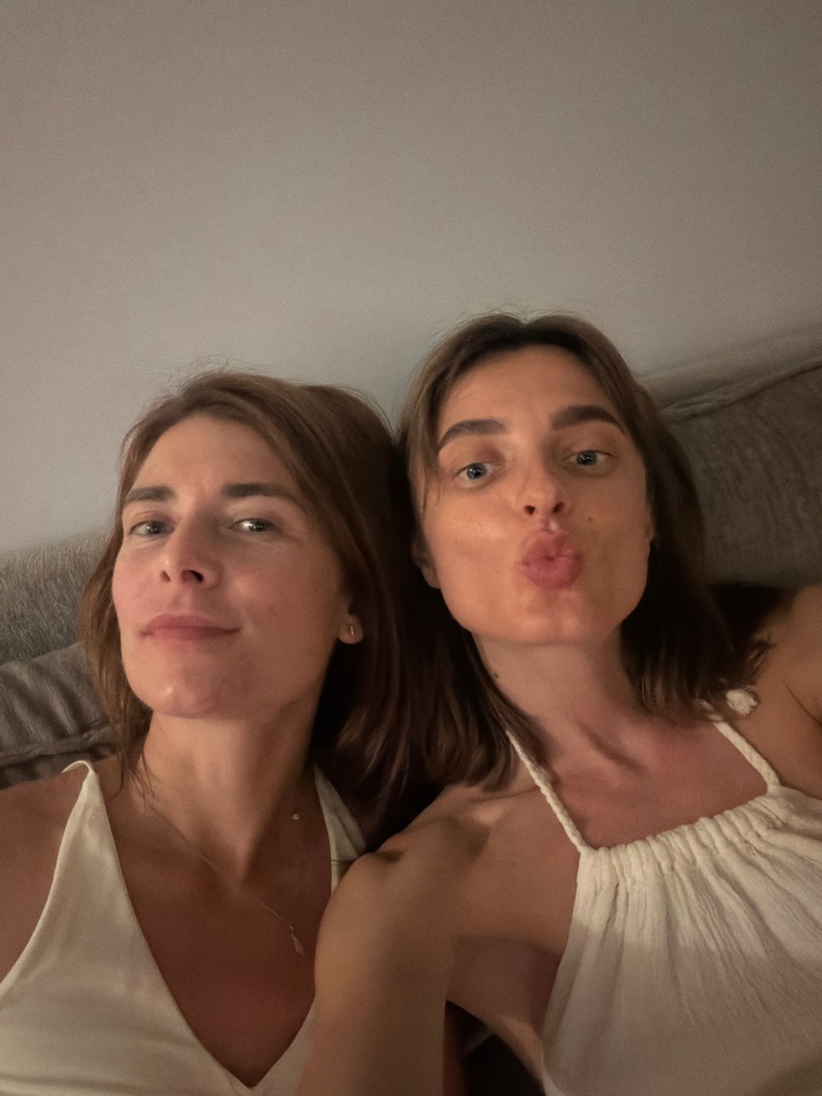Women document evening moments through selfies in Tel Aviv