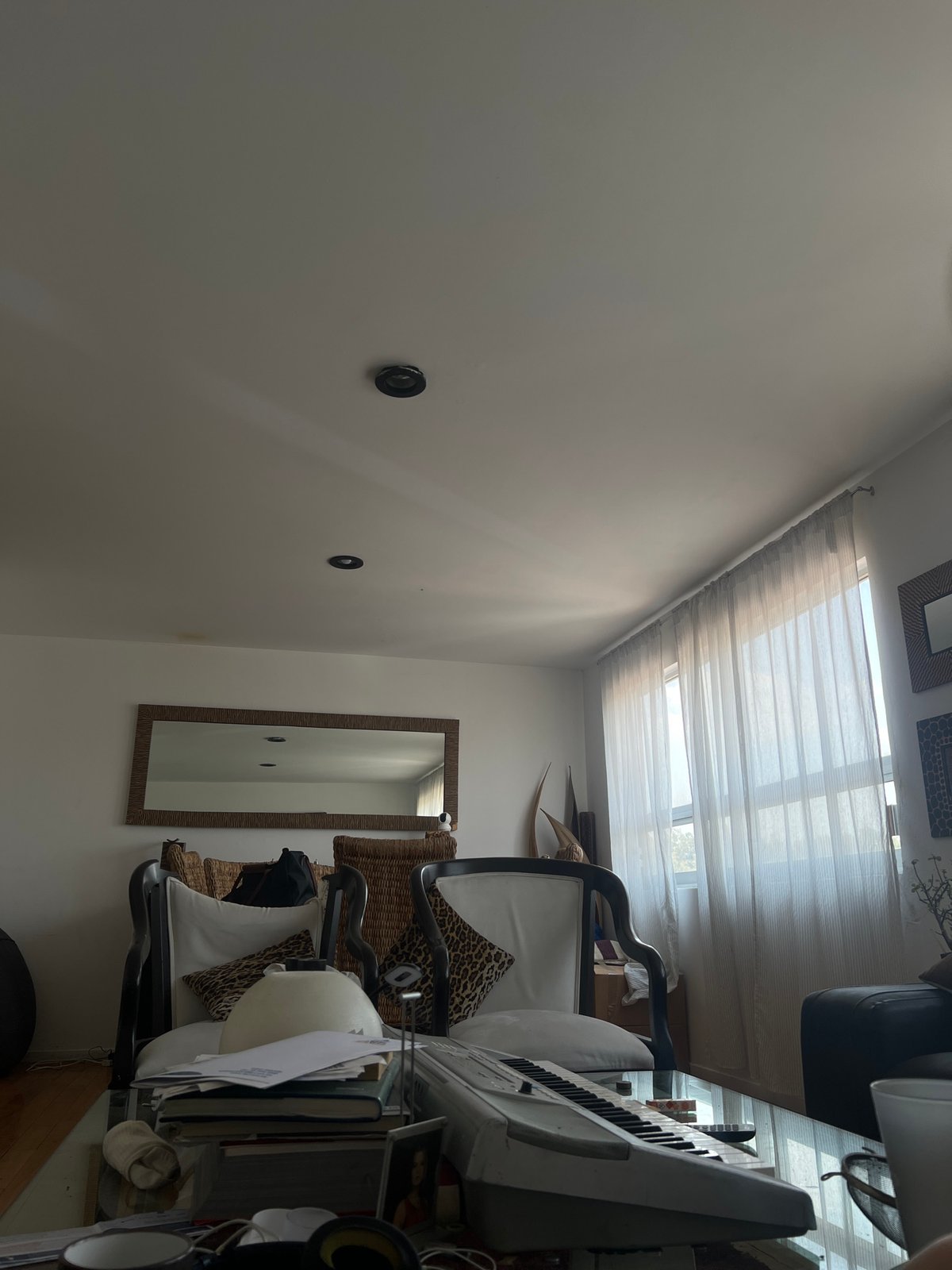 Interior room with black fixtures documented in Mexico City