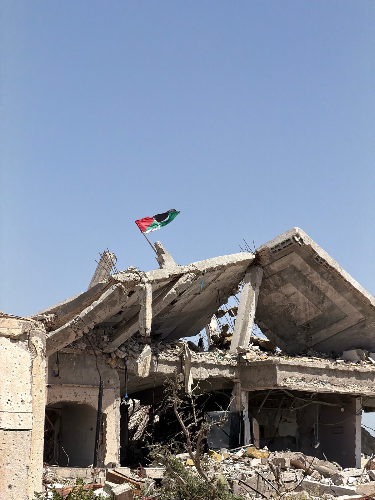 Destruction documented in al-Qarara with damaged buildings, infrastructure