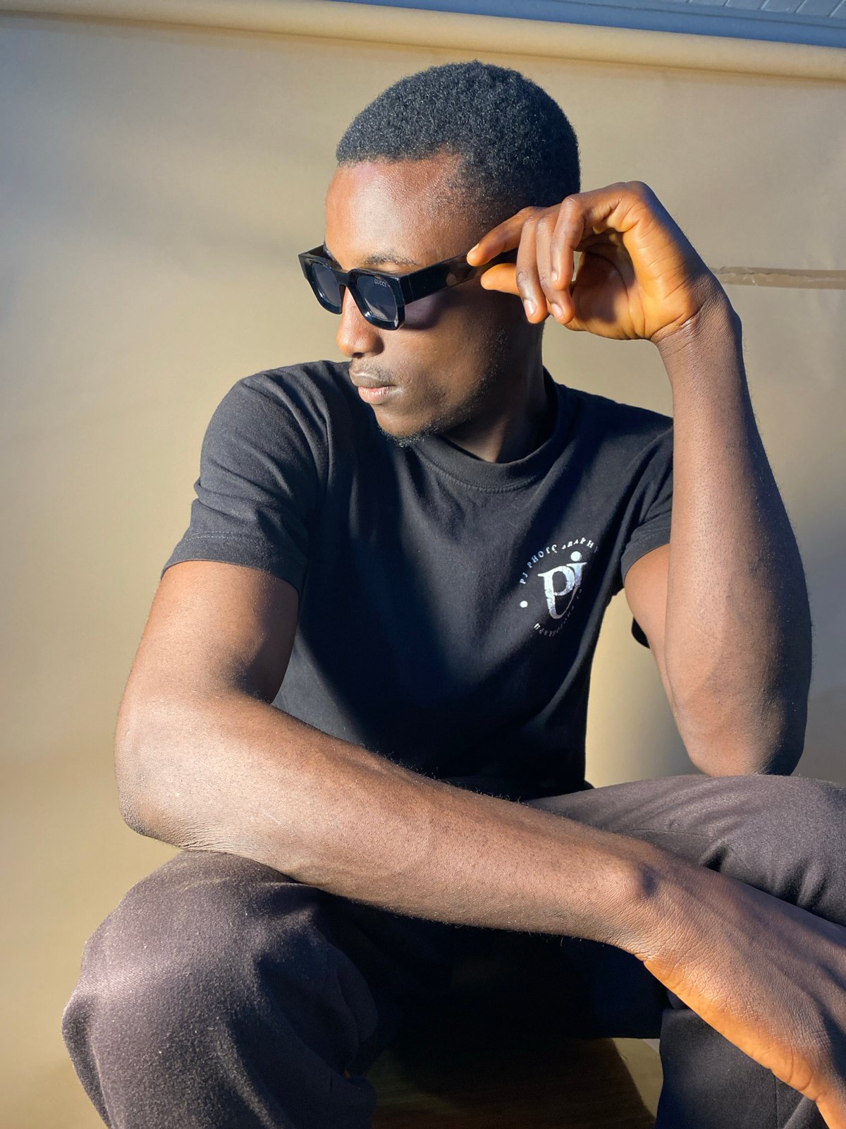 Branded t-shirt photo shoot across multiple setups in Bukuru