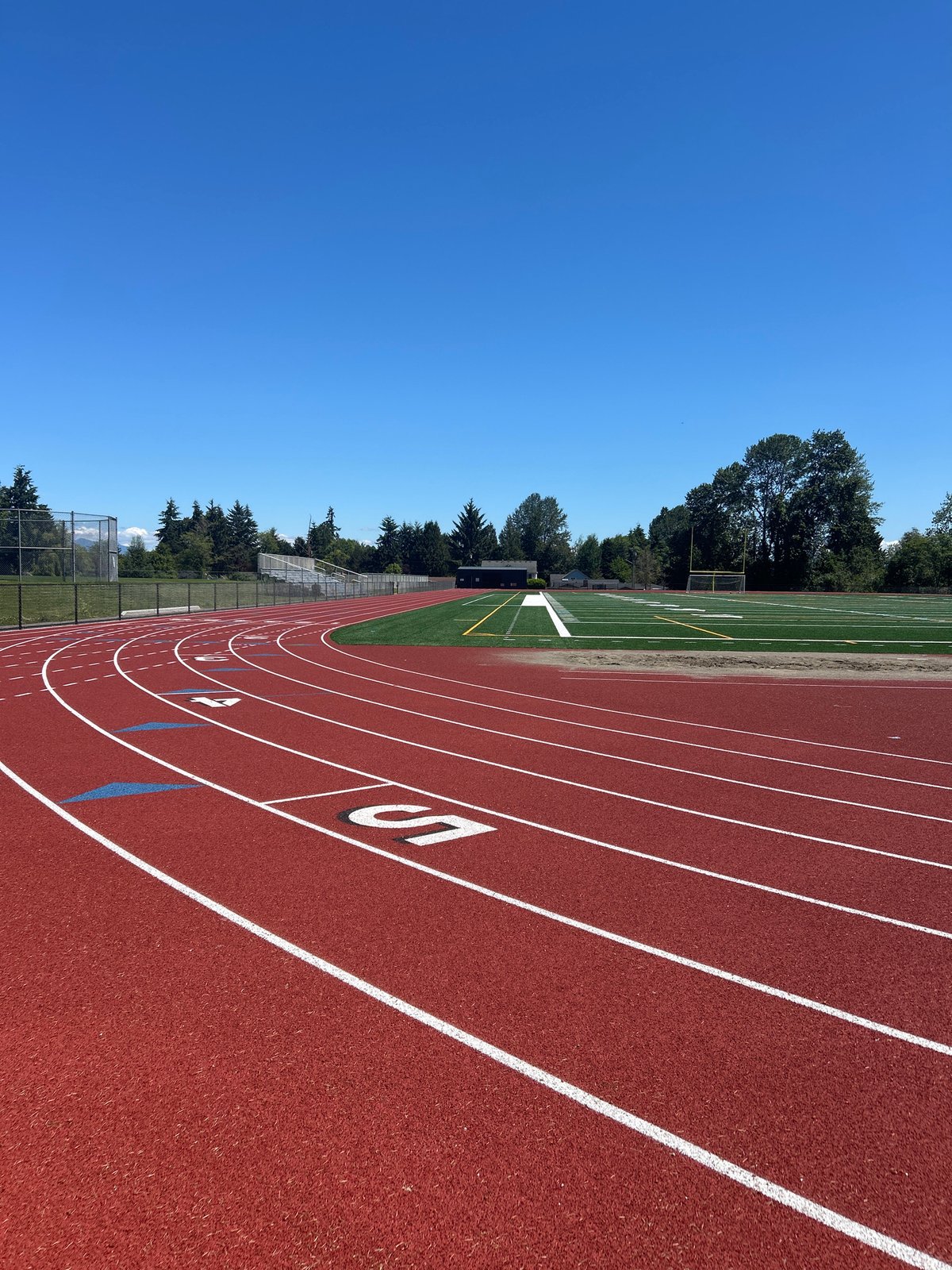 Athletic track facility observed in Everett under clear skies
