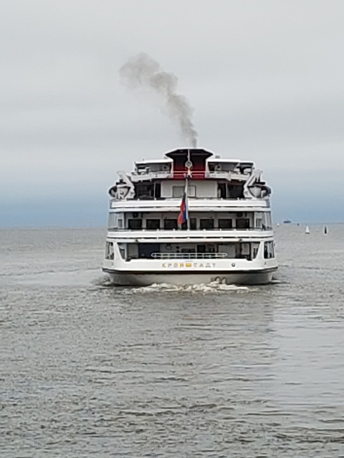 River cruise ship passes Krokhino's iconic flooded church ruins
