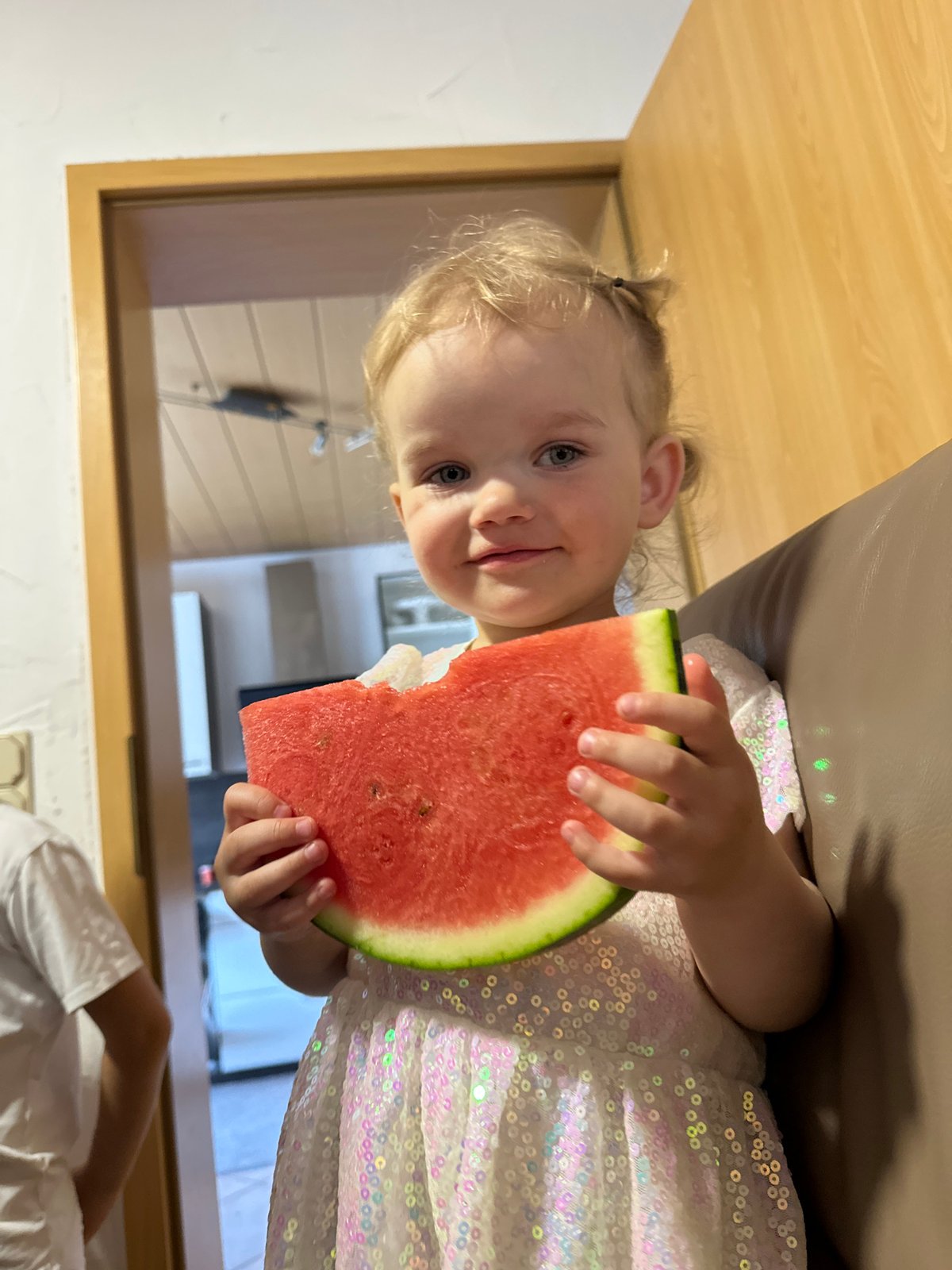 Family gathering with children, food, and play in Niederquembach