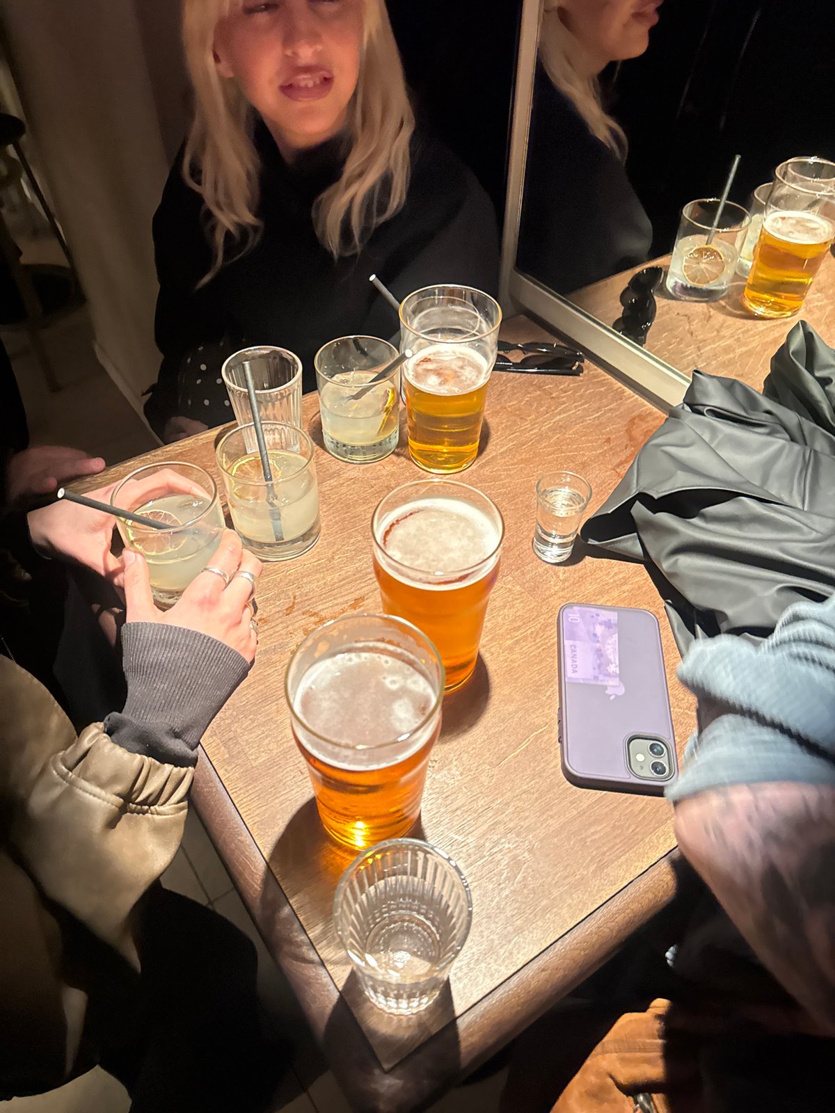 Late-night drinks gathering documented in Paris
